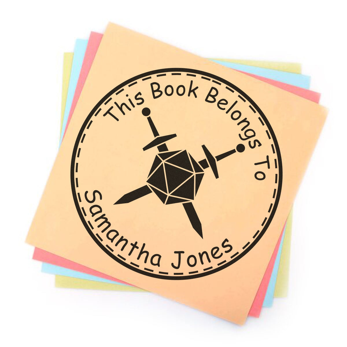 Custom round book stamp and seal on pastel sticky notes, black This Book Belongs To design with Samantha Jones name.