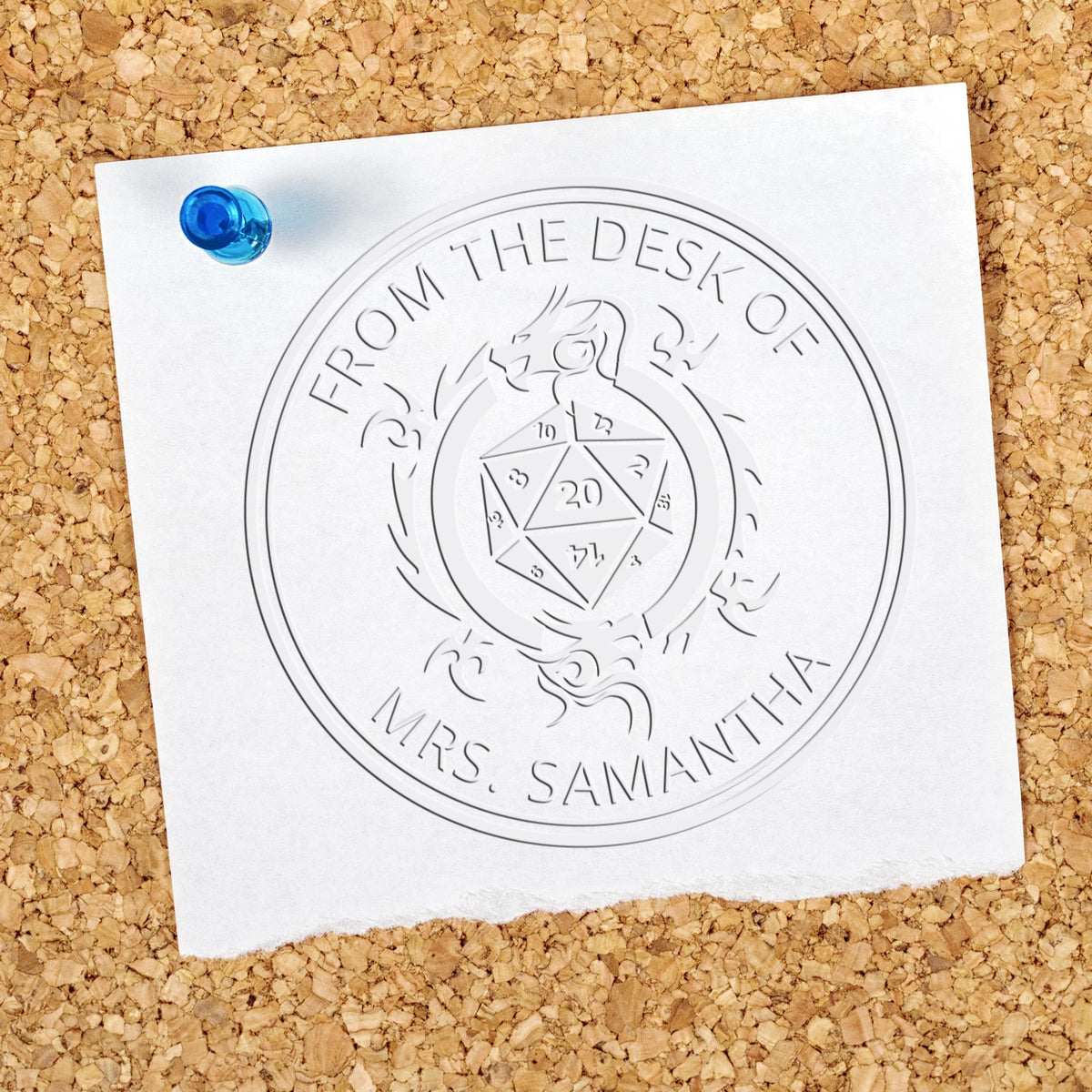 ESS Talisman of Pure Good Game Player handheld fantasy embossing seal in use, featuring intricate design on personalized Ex Libris stamp.