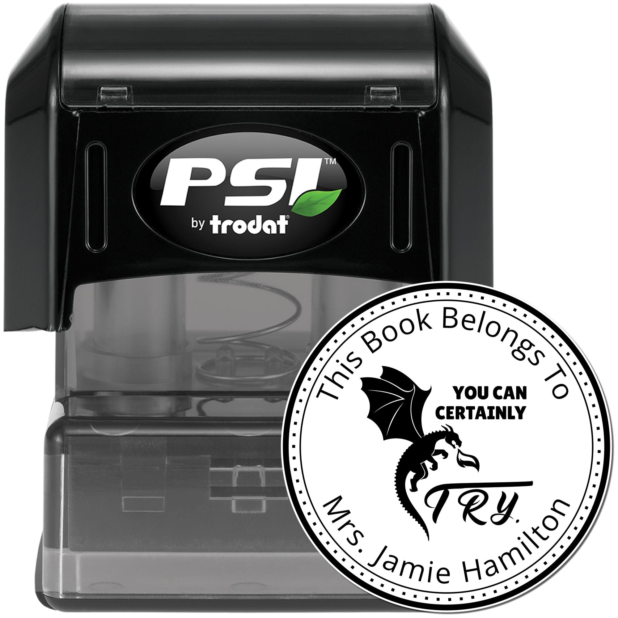 Black PSI by trodat self-inking stamp with clear case and round bookplate seal featuring dragon graphic and white text.