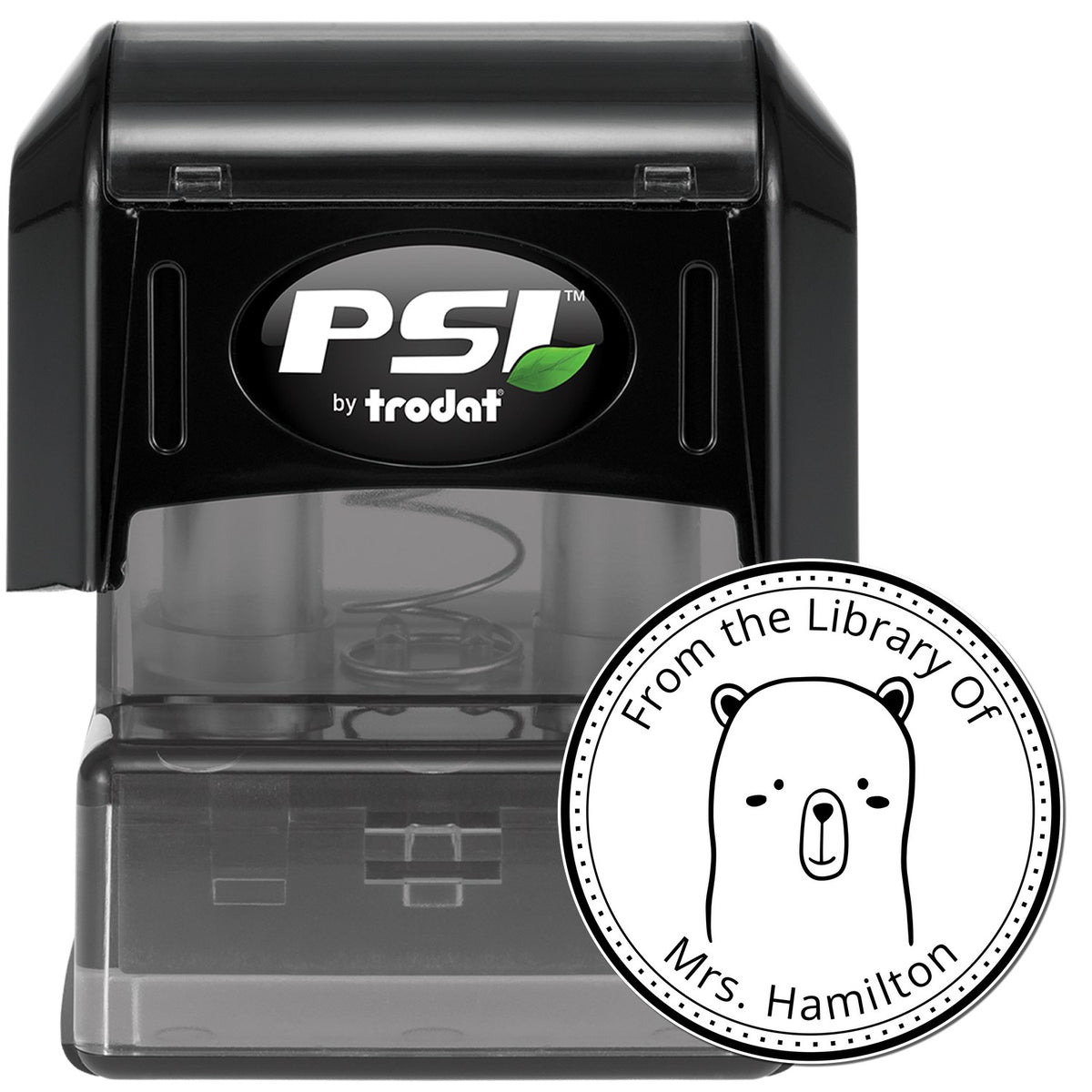 Image of a black pre-inked stamper with a circular imprint design. The stamp features a WhiskerTwist cartoon animal and the text "From the Library Of Mrs. Hamilton." Keywords: WhiskerTwist Cartoon Animal Pre-Inked Customizable Library Ownership Stamp, Customizable Mailing Stamper.