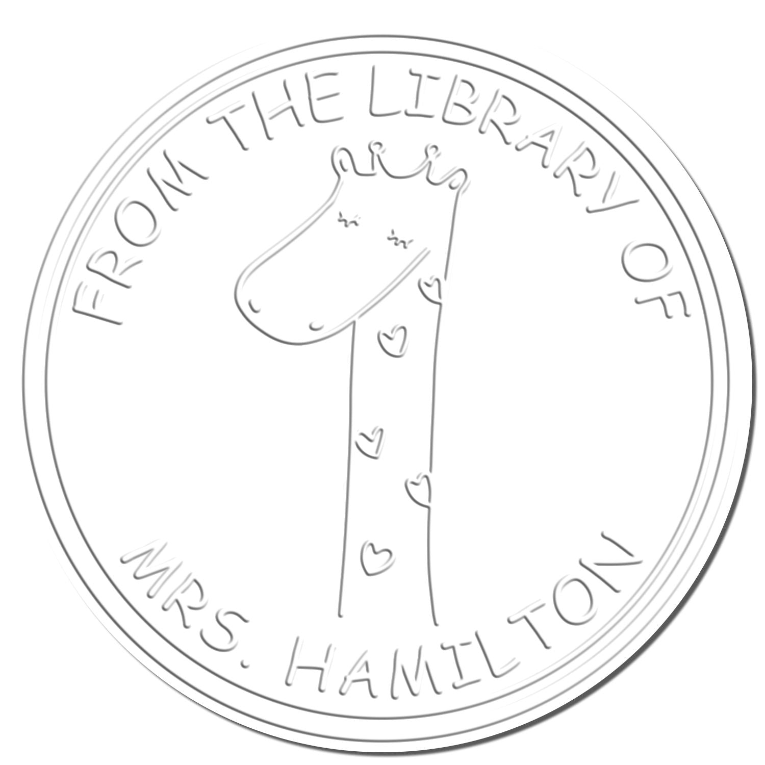 A Soft SquiggleSquash cartoon animal design featuring a giraffe with a crown and hearts is embossed on a Custom-Made Book Signature Embosser. The text reads From the Library of Mrs. Hamilton. This Customized Home Stamper is ideal for personalizing books.