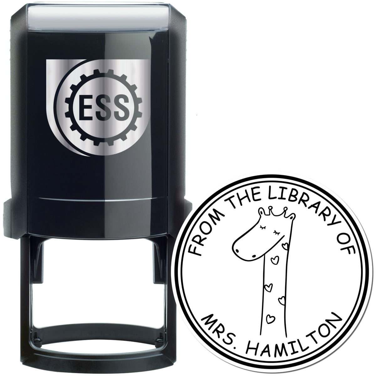 Black self-inking stamp with "ESS" logo. Features a SquiggleSquash cartoon animal design with a giraffe and hearts, labeled "From The Library Of Mrs. Hamilton." Ideal for a customized address stamper or custom-made library stamp.