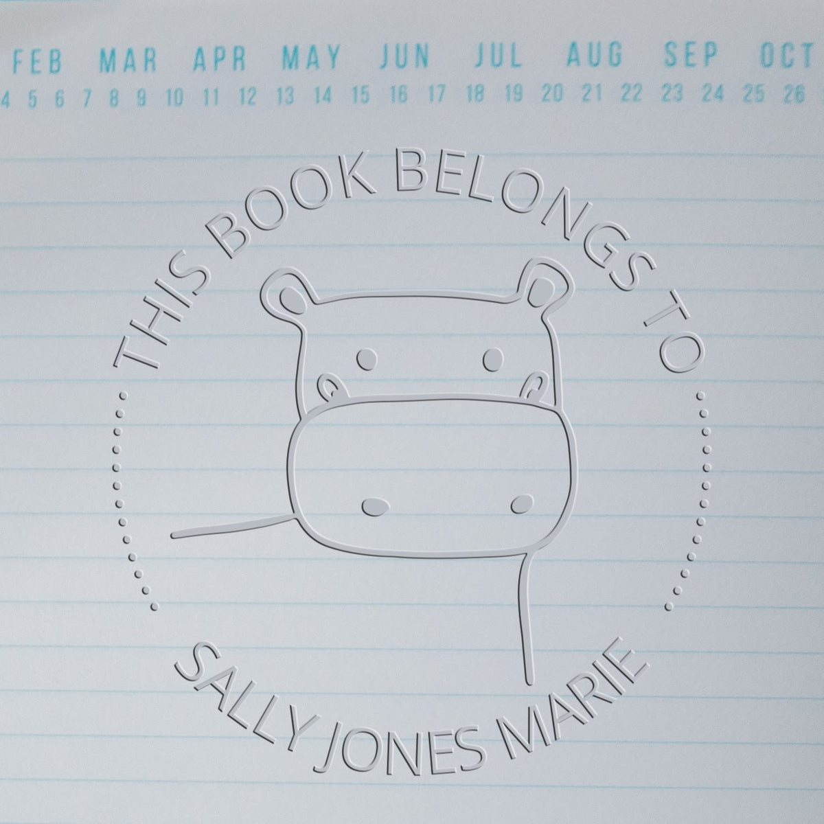 TizzyTwitch Cartoon Animal Hybrid Customized Name For Books Seal featuring a hippo design embossed on paper. Text reads "This Book Belongs To Sally Jones Marie." Personalizable Address Stamper option available. Background shows a calendar layout.