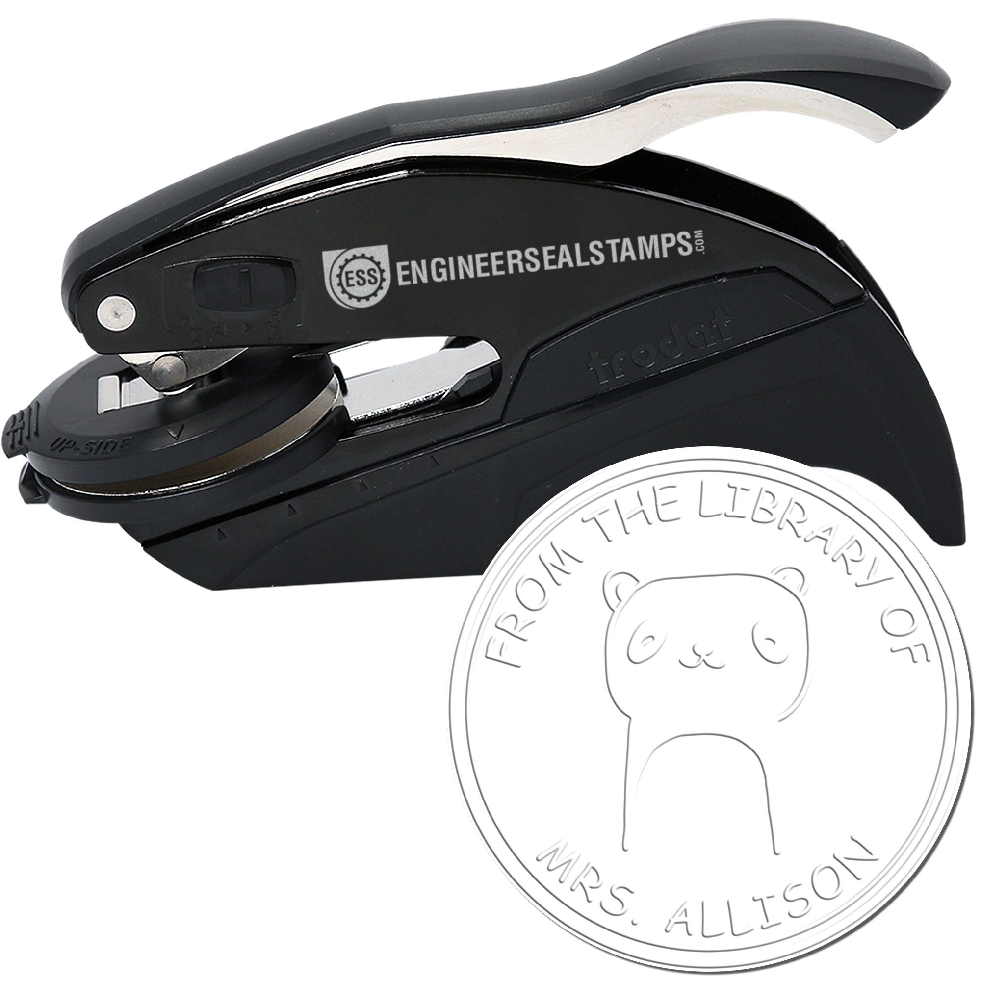Image of a black embosser labeled "Engineer Seal Stamps" with a round imprint featuring a TumbleTuft cartoon animal hybrid. The imprint reads "From the Library of Mrs. Allison." This personalized home stamp is part of the Embosser collection.