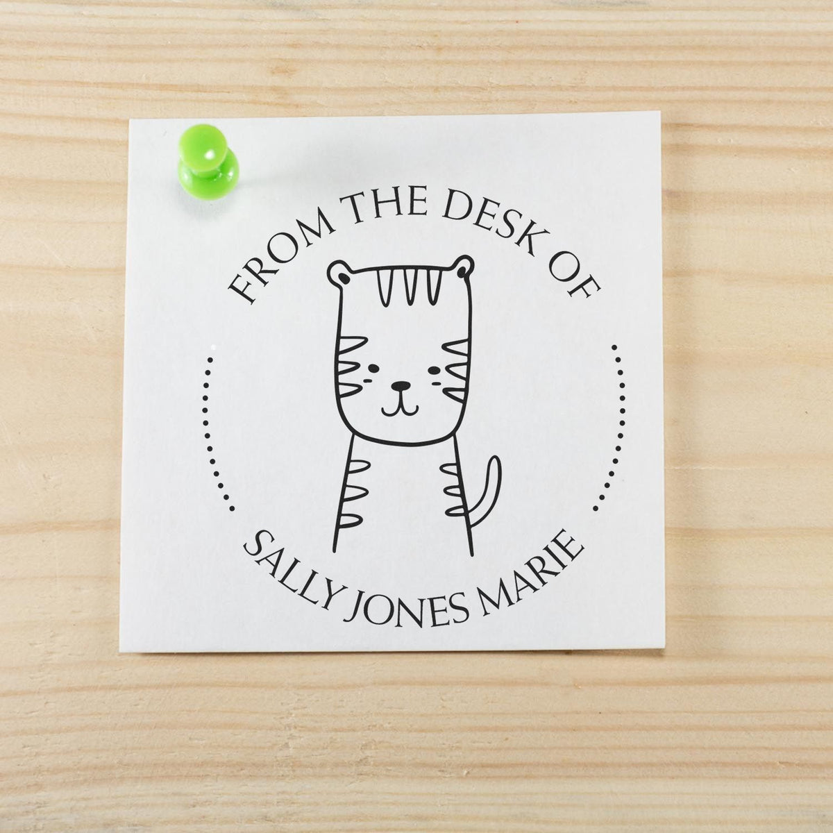 TizzyTumble Cartoon Animal Pre-Inked Customizable Book Belongs To Stamp featuring a cute tiger design on a note pinned to a wooden surface. Personalizable Mailing Stamp text reads "From the Desk of Sally Jones Marie."