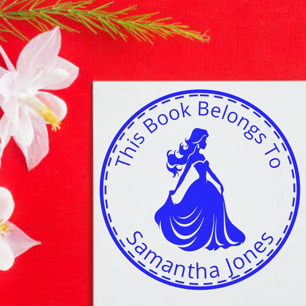 Blue circular book ownership stamp seal for Samantha Jones on a white card, against a red background with a white flower.