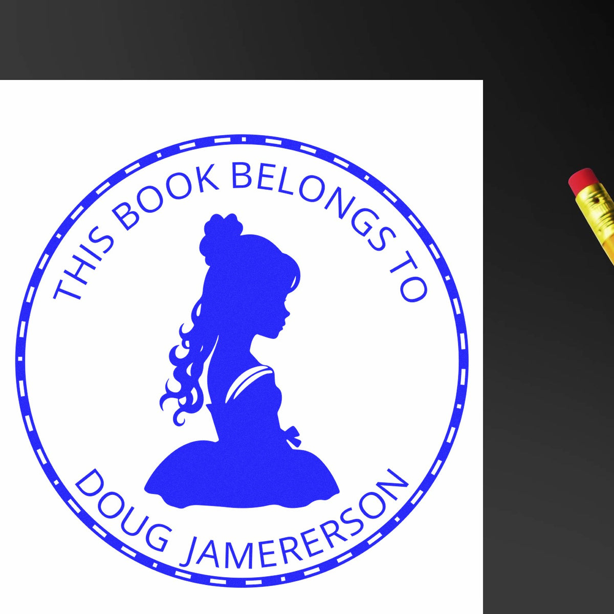 Blue circular book stamp seal with girl's silhouette and This Book Belongs to Doug Jamerson text, beside a red-and-yellow stamp handle.