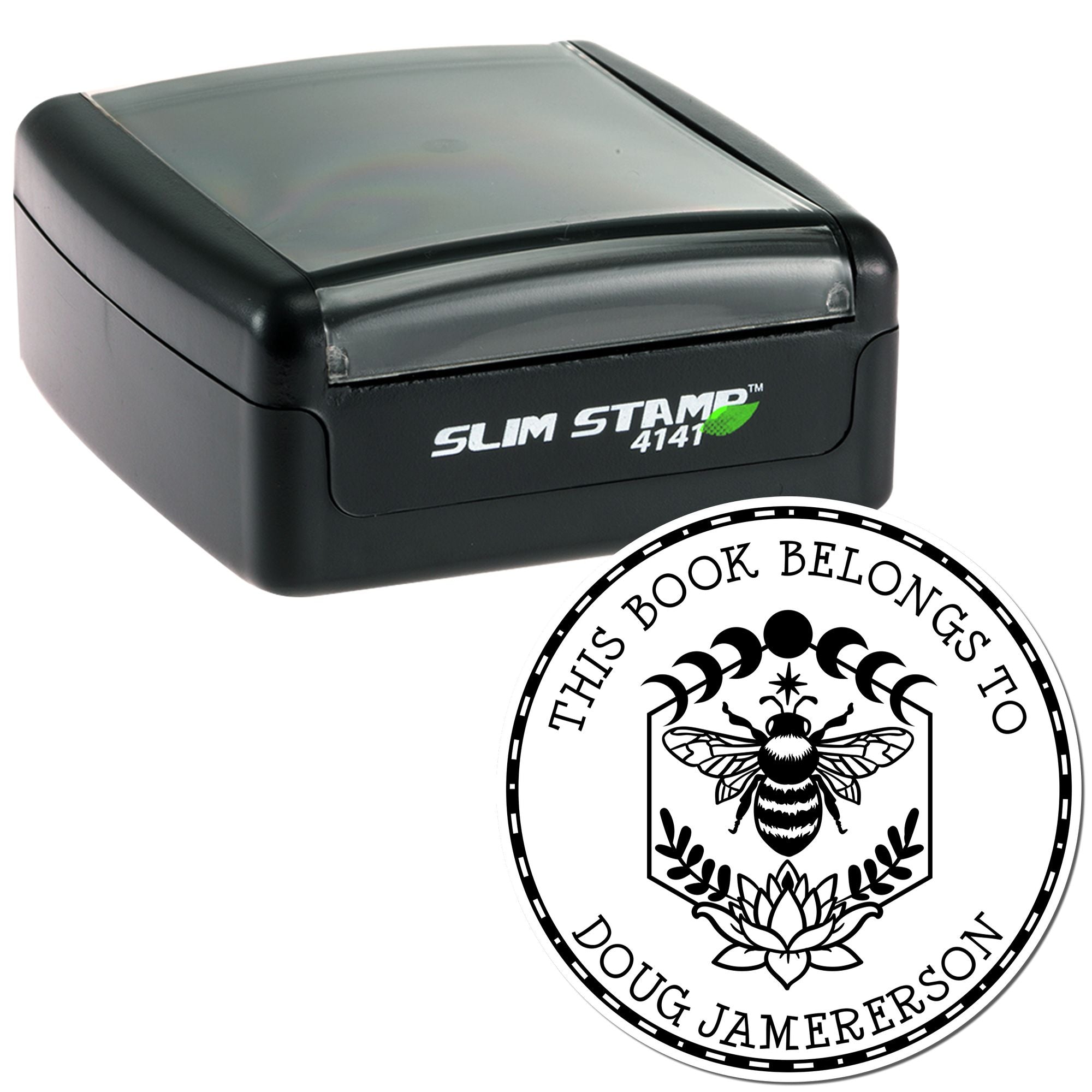 Black SlimStamp 4141 self-inking stamp with gray lid and round book-belongs-to seal featuring bee and lotus design.