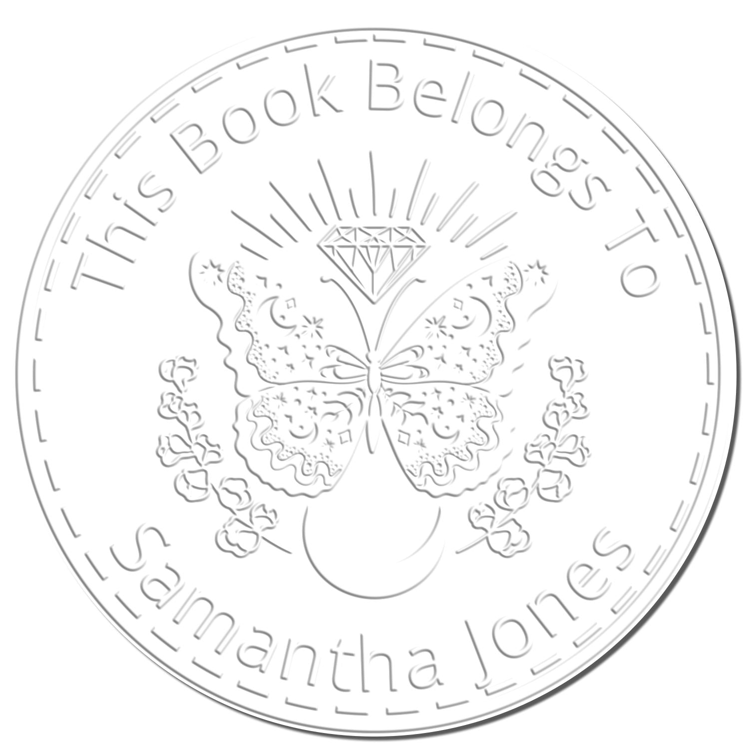 White embossed round book stamp seal with butterfly, diamond and floral design; reads "This Book Belongs to Samantha Jones"