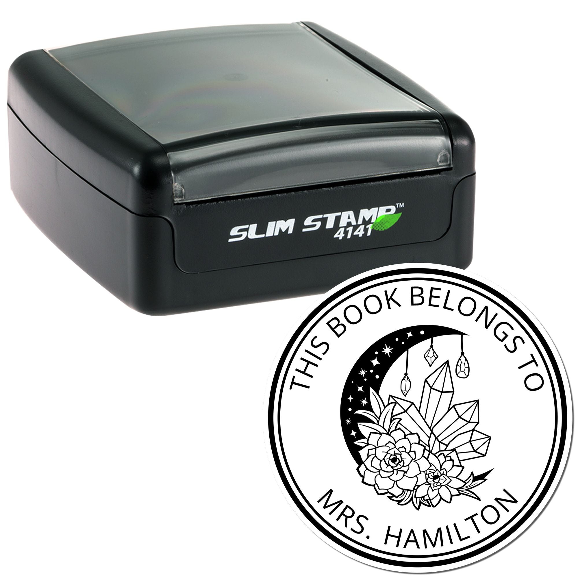 Black Slim Stamp 4141 self-inking stamp and circular black-and-white seal reading This Book Belongs To Mrs. Hamilton with crystals and flowers.