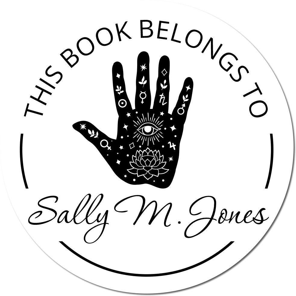 Black circular personalized bookplate stamp with mystical hand, eye and lotus design, reading Sally M. Jones on white seal.
