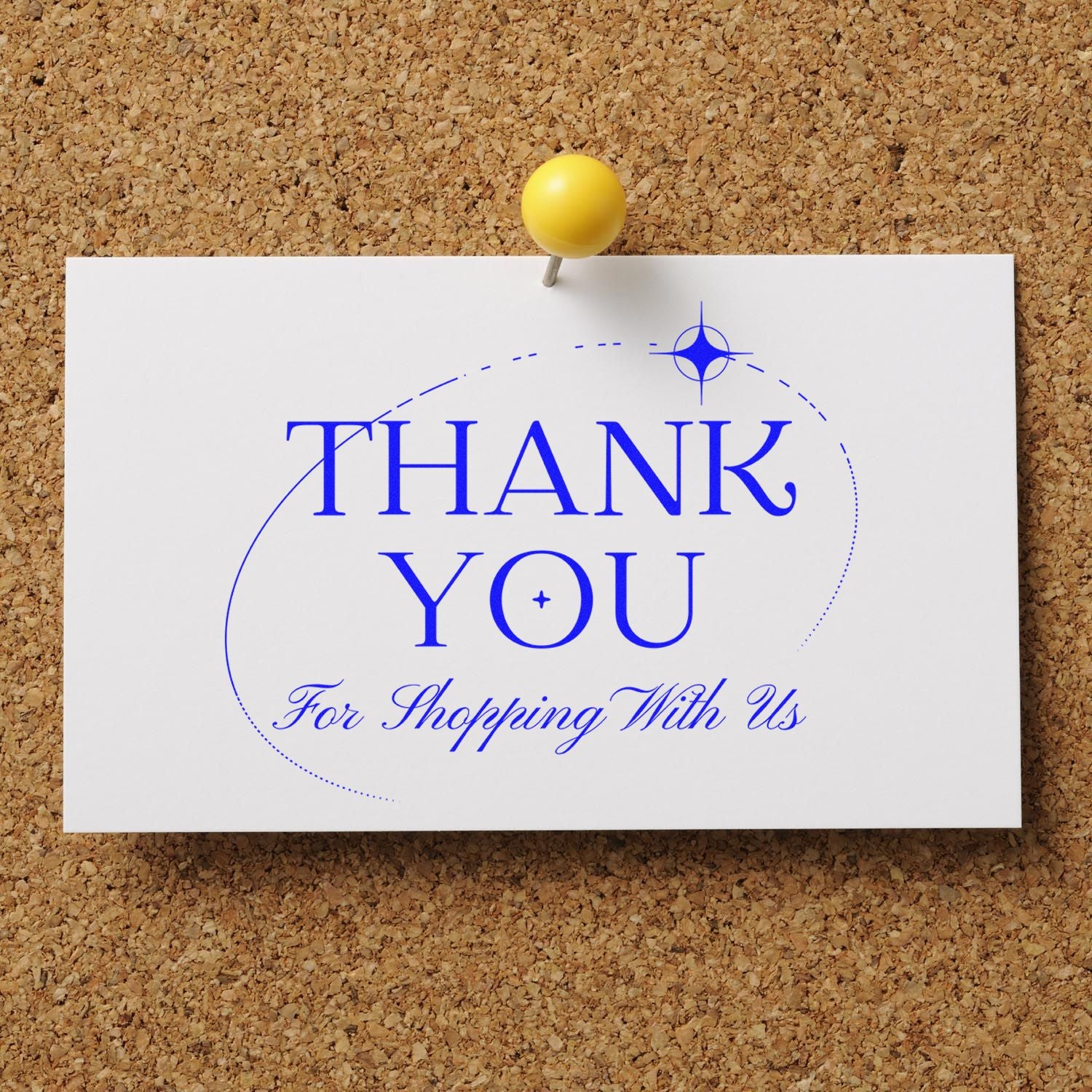 Blue thank-you stamp and seal on white card, pinned with a yellow pushpin against corkboard.