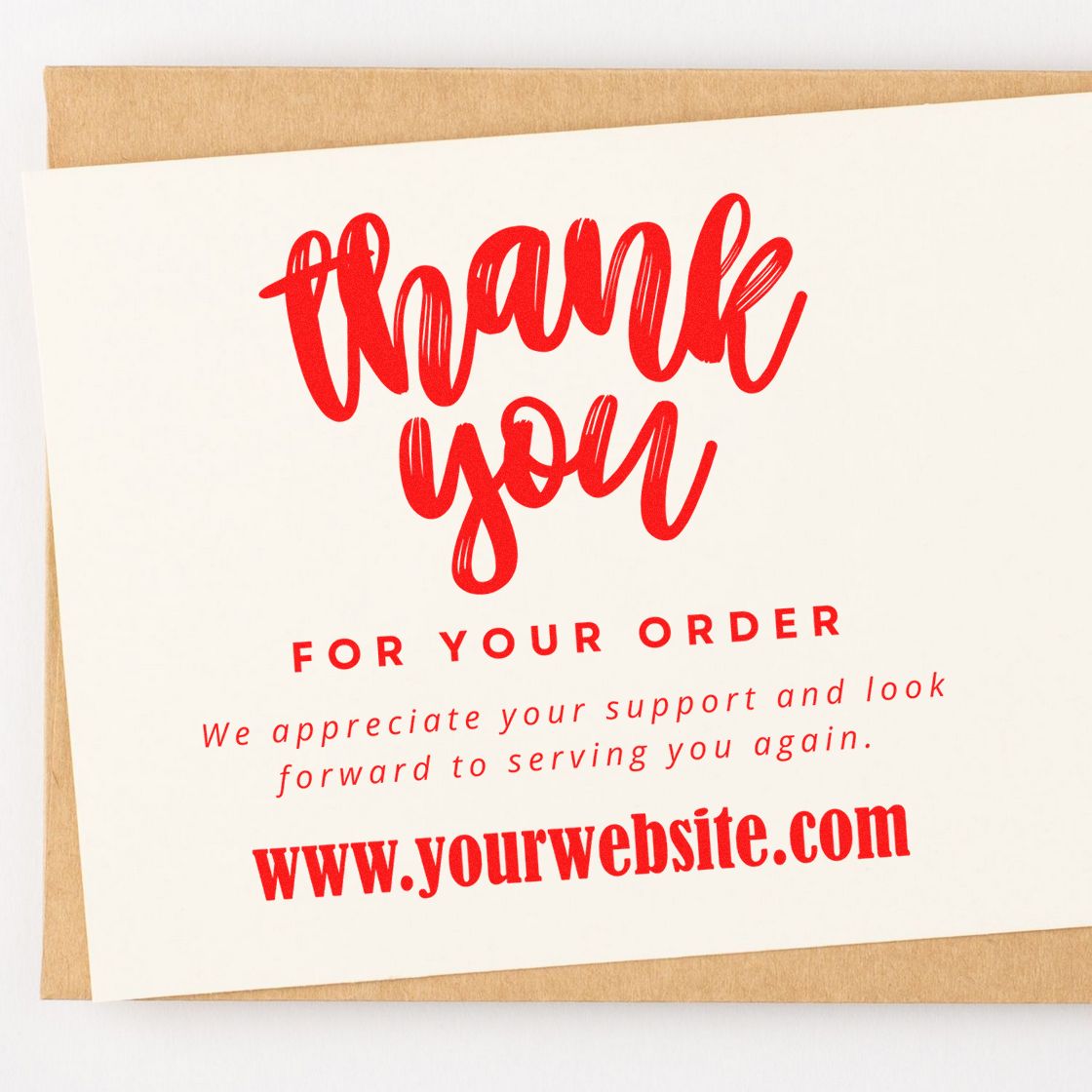 Custom red thank-you stamp and seal card with order message and website on white paper over kraft envelope.