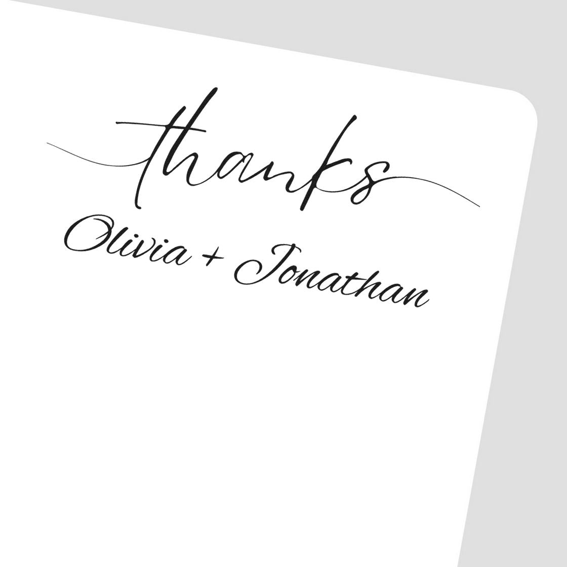 Black script custom stamp/seal reading thanks Olivia + Jonathan on a white card, with elegant handwritten lettering