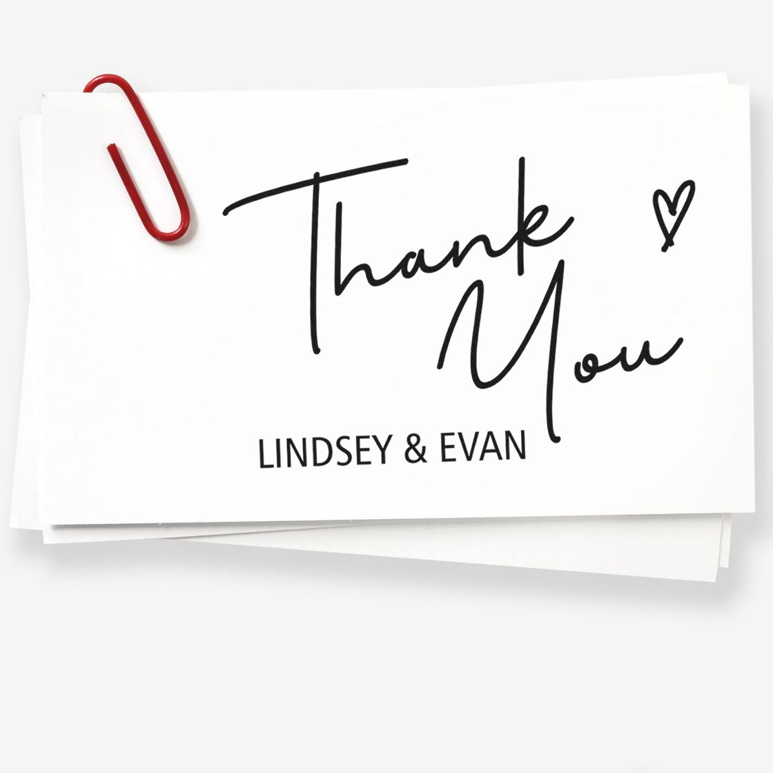 Custom thank-you stamp and seal on white card, black script lettering, red paperclip, Lindsey & Evan name.