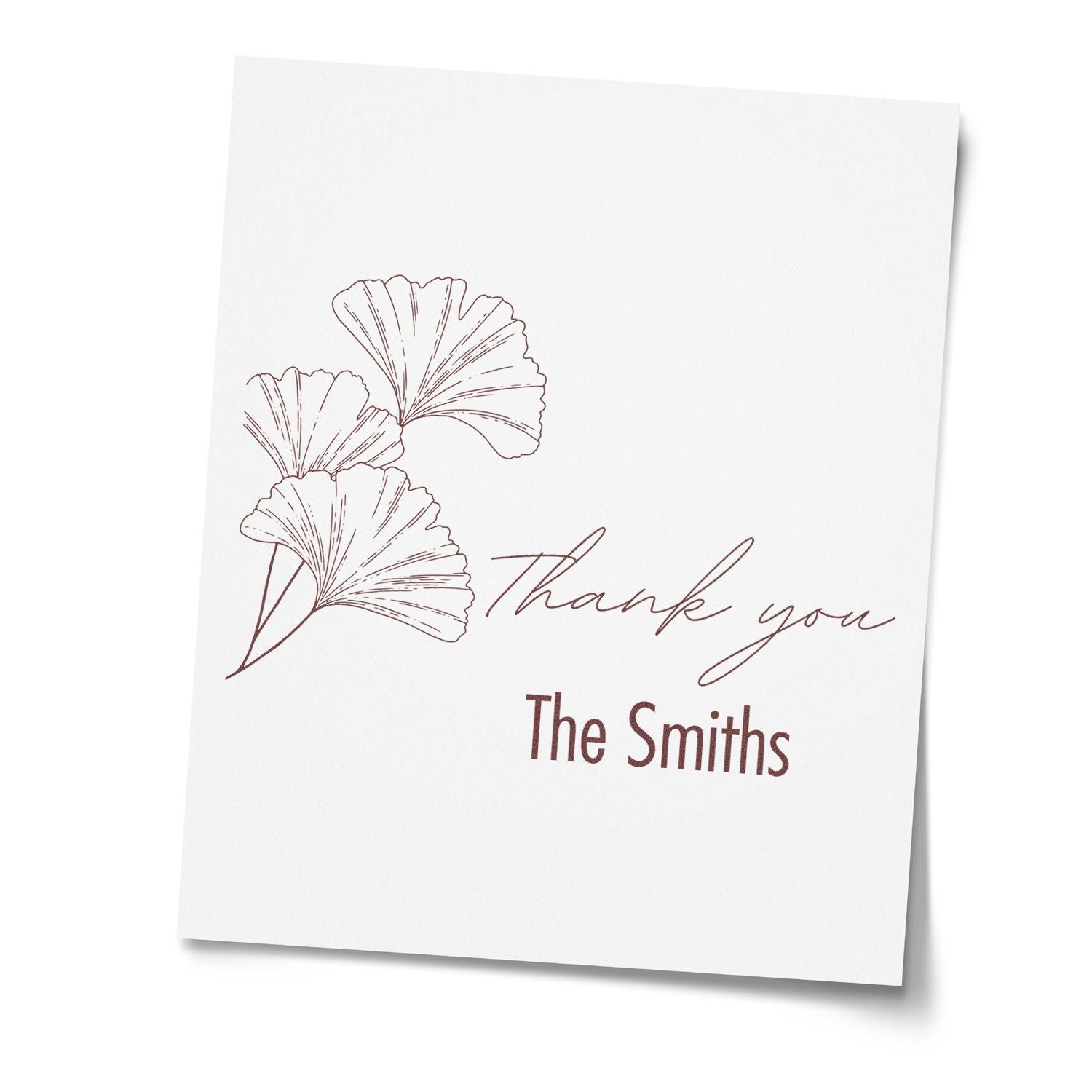 Custom stamp and seal design with brown ginkgo leaves, handwritten Thank you, and The Smiths on white background.