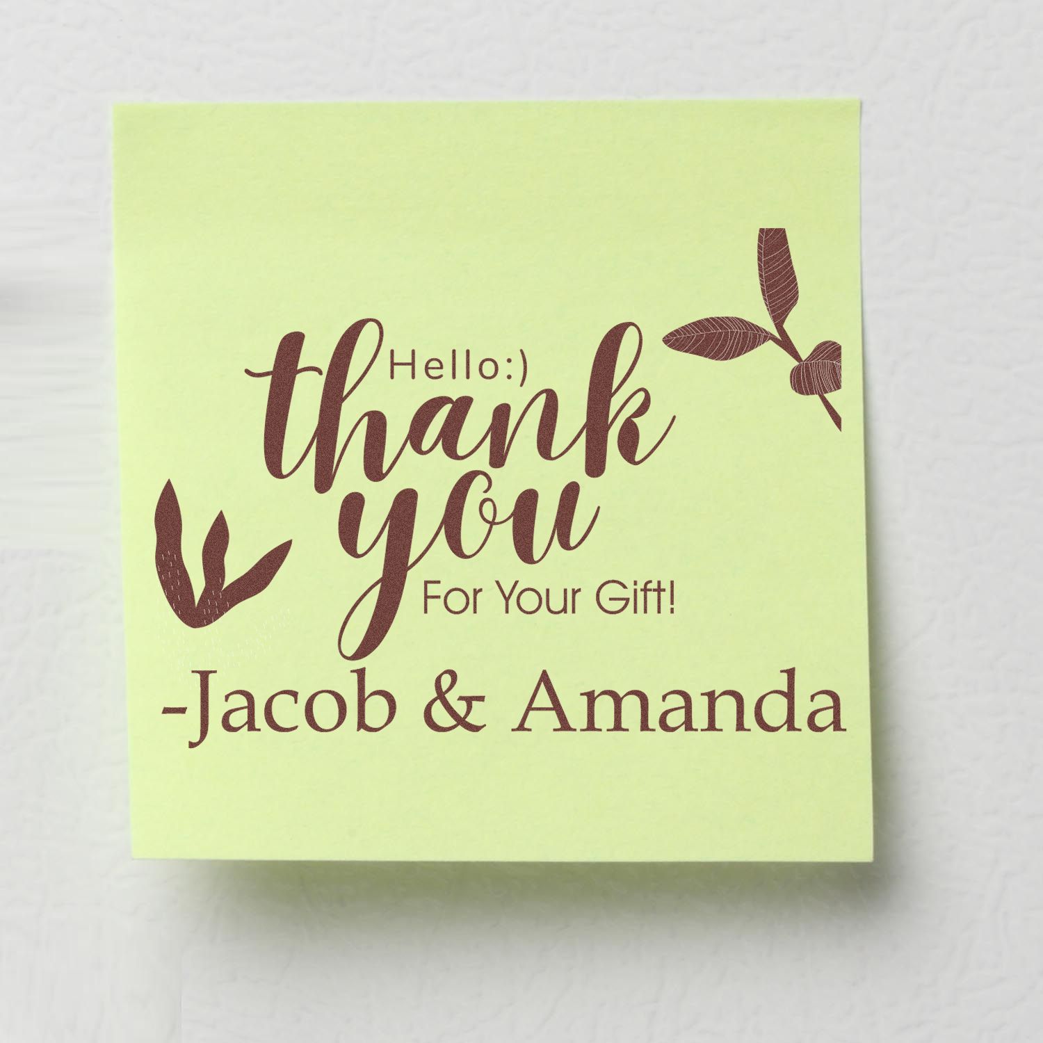 Lime green custom thank-you stamp seal with brown script text, leaf accents, and Jacob & Amanda names.