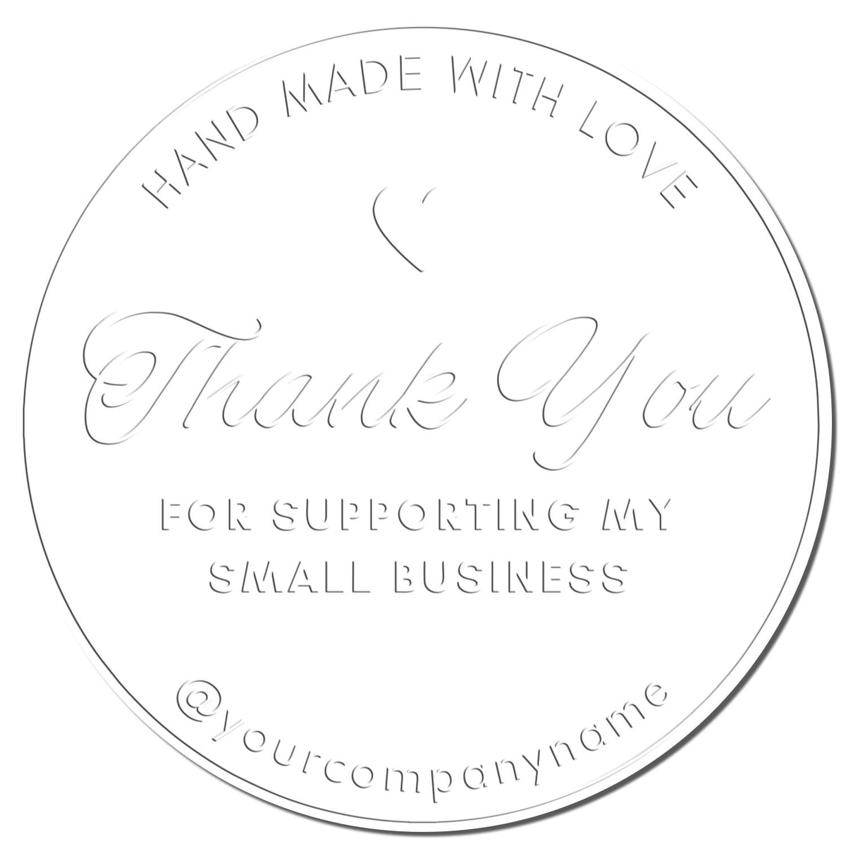 Shiny thank you stamp with a circular heartfelt gratitude design, featuring custom "Thanks" embossing on paper.