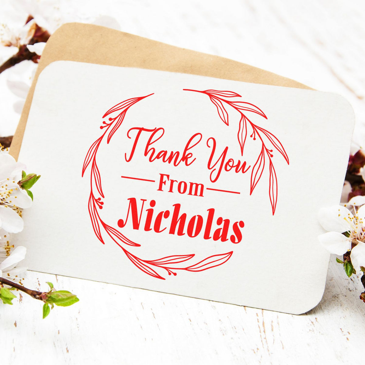 Round hand-drawn thank you stamp by ESS, featuring elegant gratitude design in use on a thank you card.