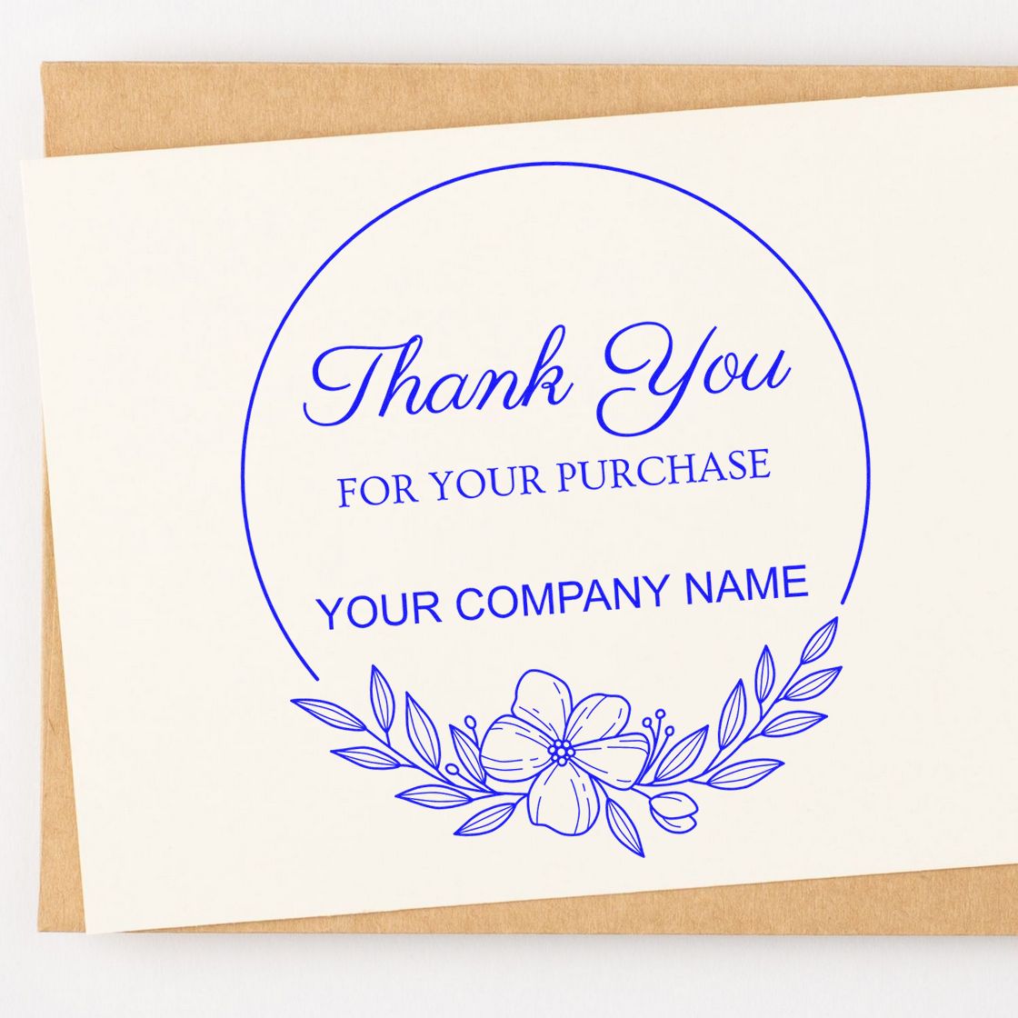 Blue custom thank-you purchase stamp with circular seal, floral accents, and company name on white card over tan envelope.