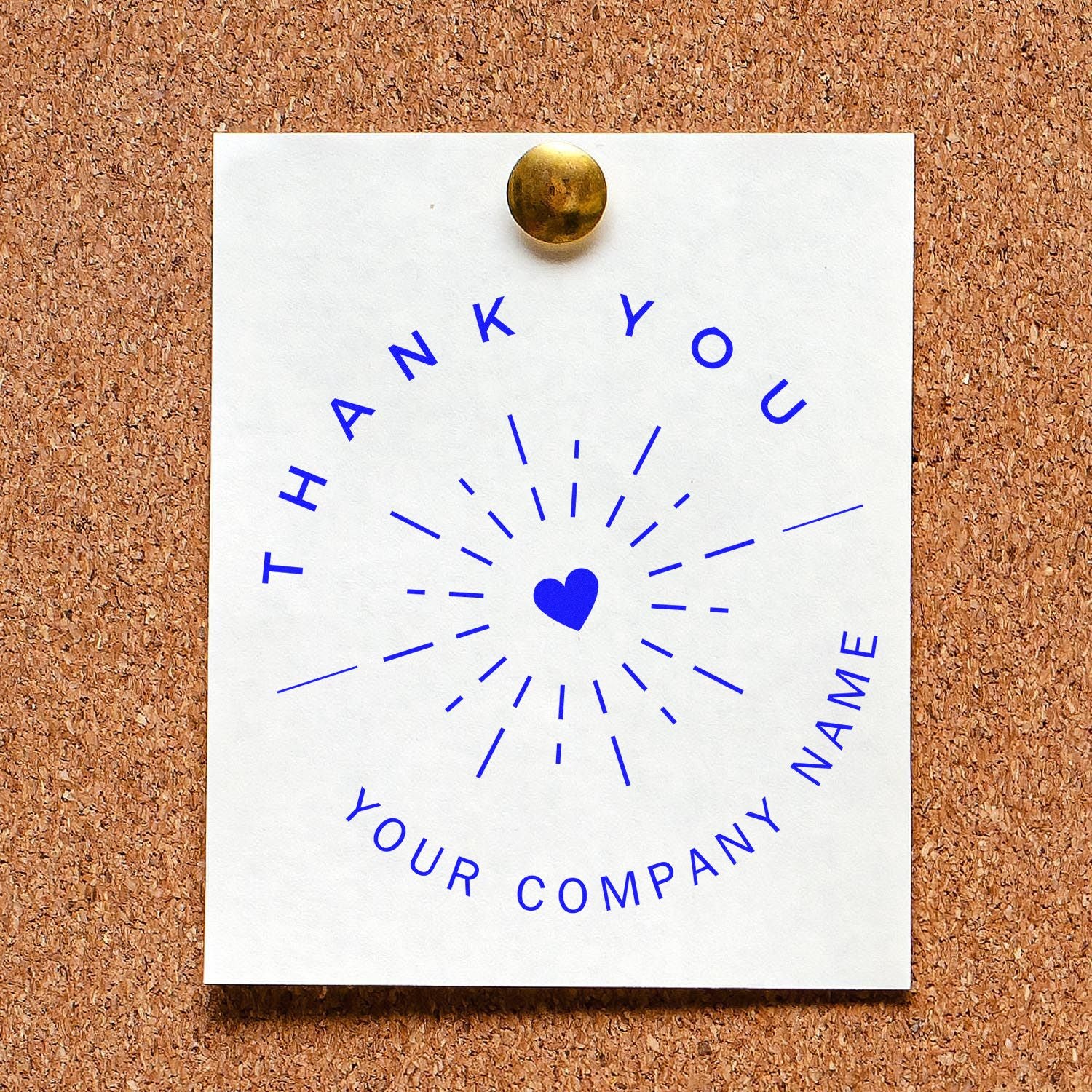 Custom blue thank-you stamp seal with heart design on white paper, pinned by a gold tack against a corkboard.