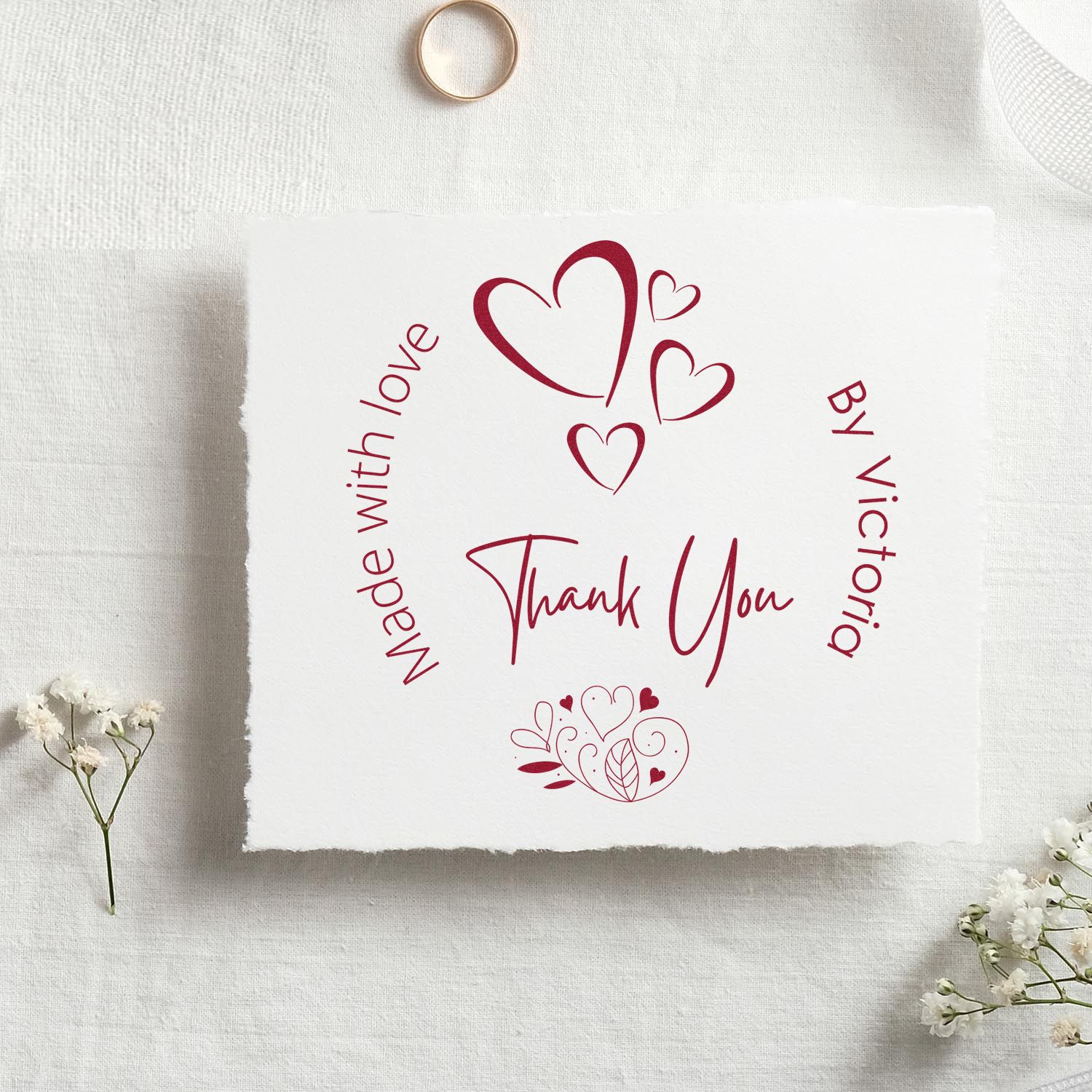 Burgundy thank you stamp and seal design with hearts, Made with love and By Victoria on white paper.