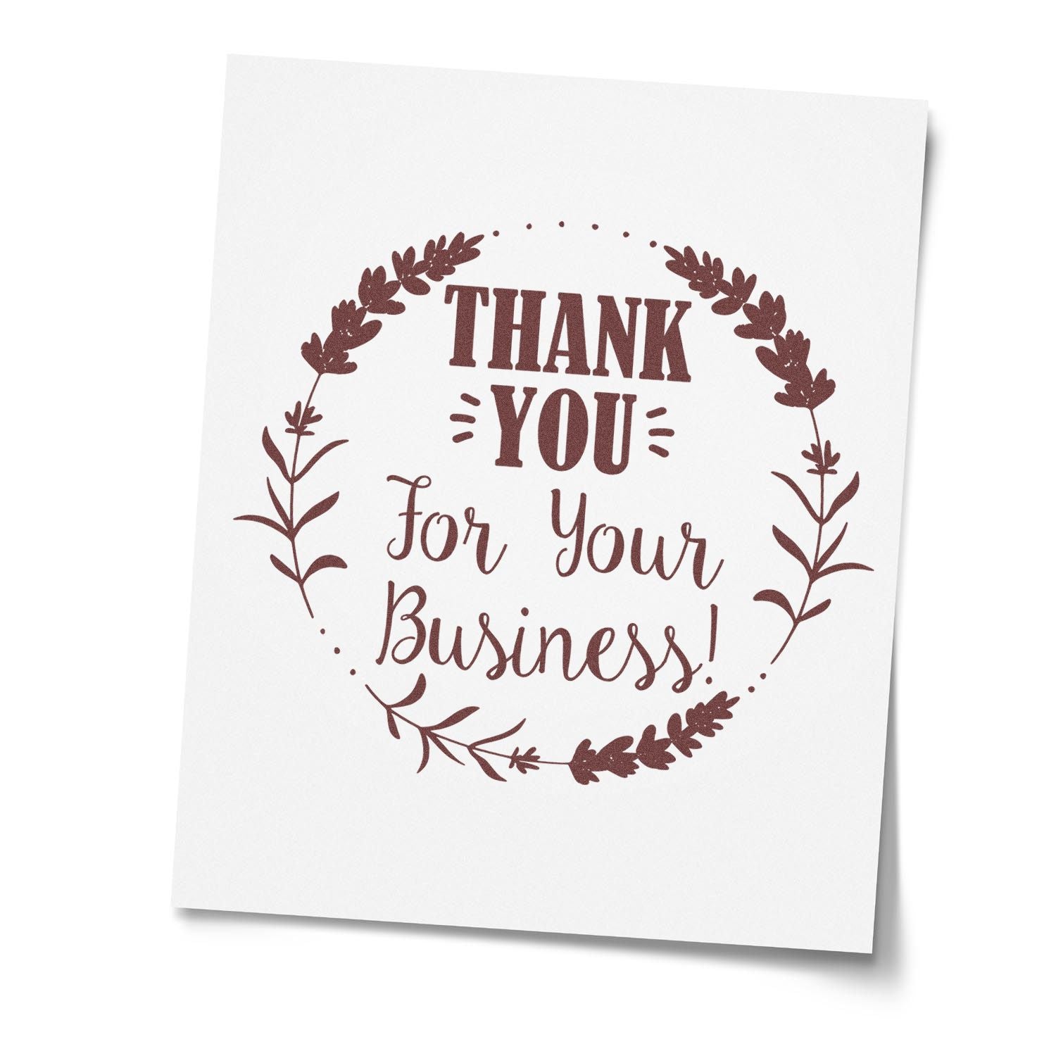 Brown thank-you for your business stamp seal with floral wreath on white paper