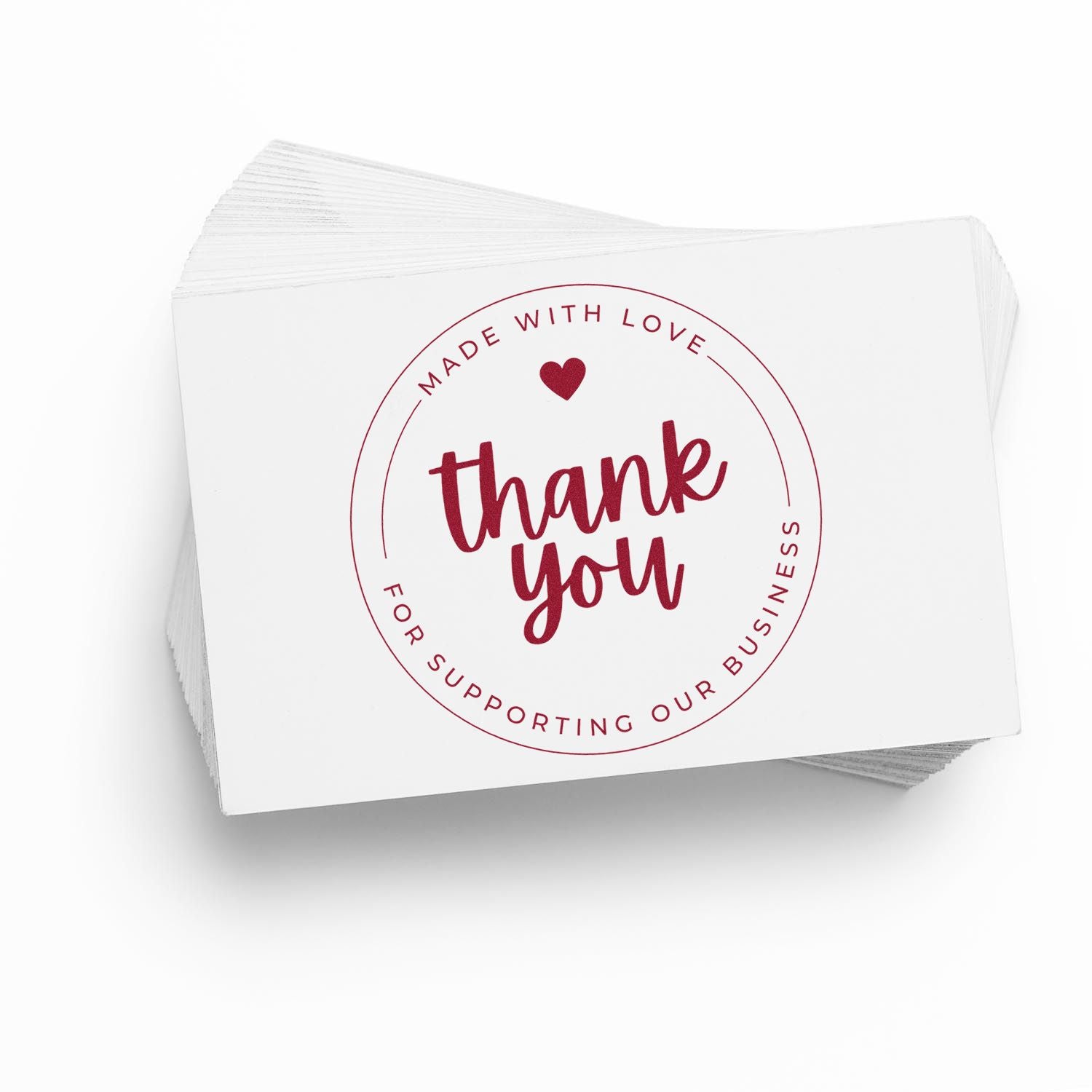 Stack of white thank-you stamp seals with maroon heart and circular Made with Love business text