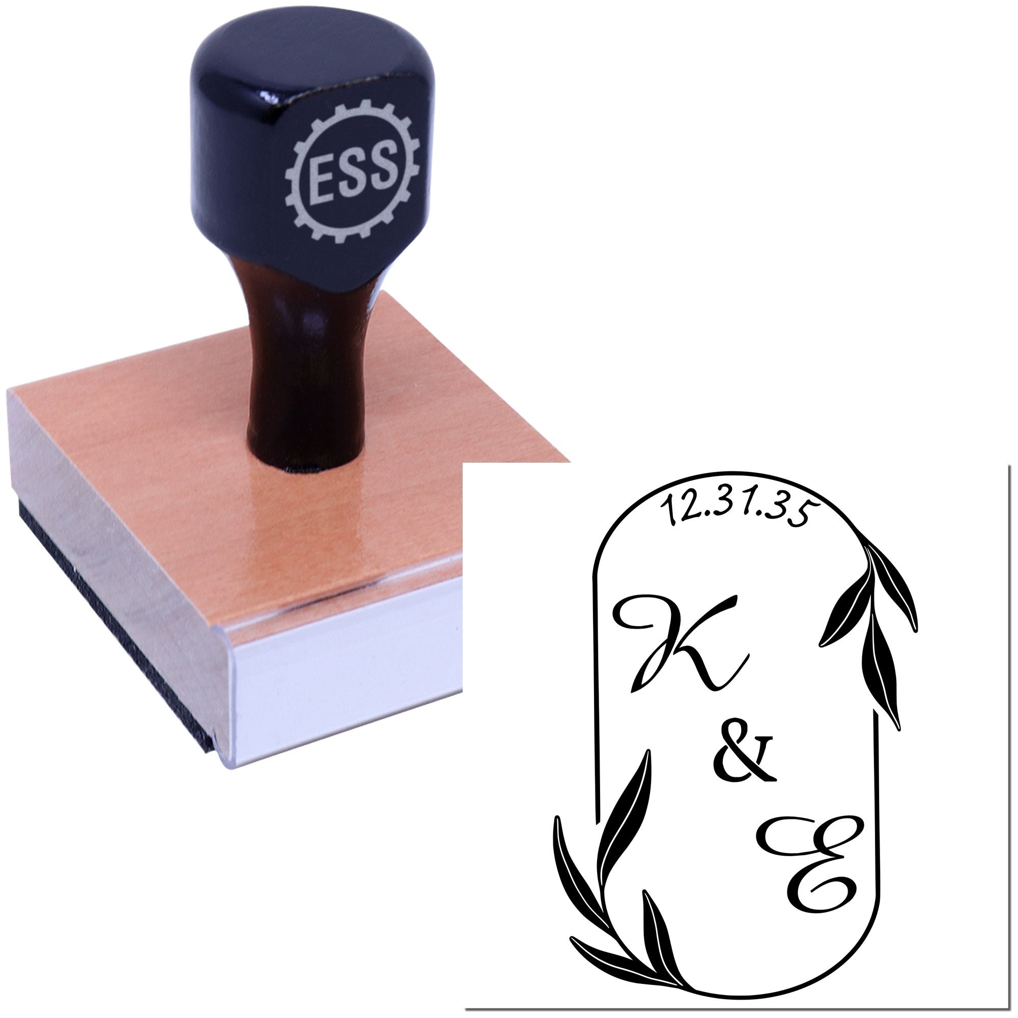 Black ESS rubber stamp on a wooden block with custom monogram seal art and leaf accents.