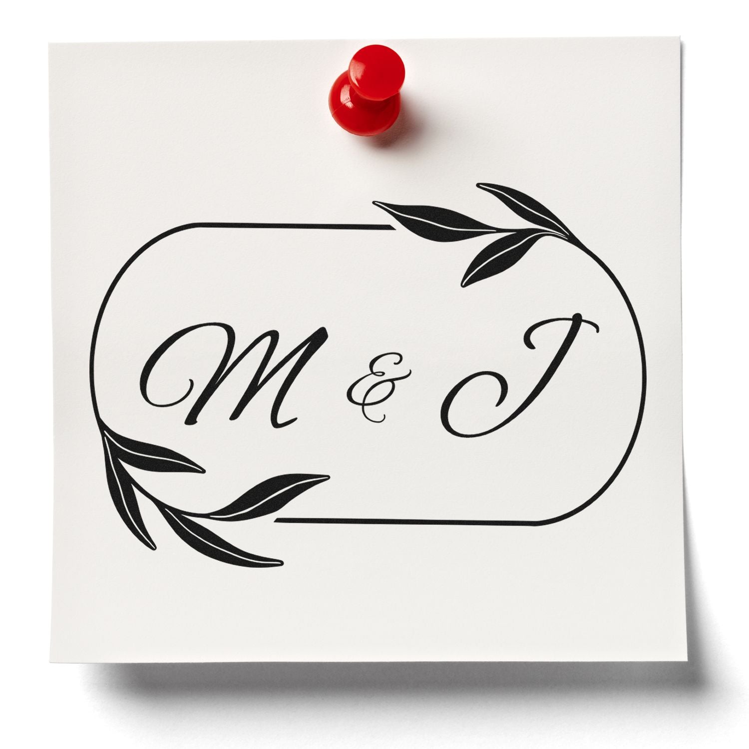 Custom stamp and wax seal design with black floral M & J monogram on white card and a red seal.