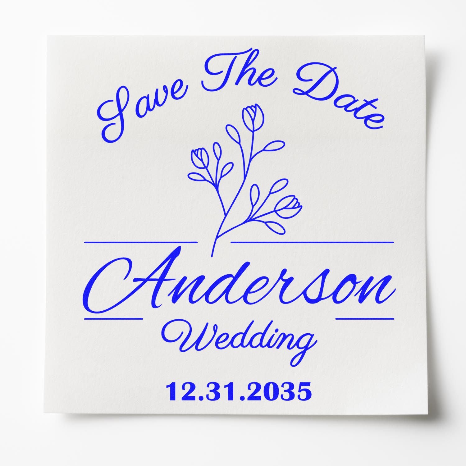 Blue wedding stamp seal with floral branch, Save the Date Anderson Wedding, and date 12.31.2035 on white card.