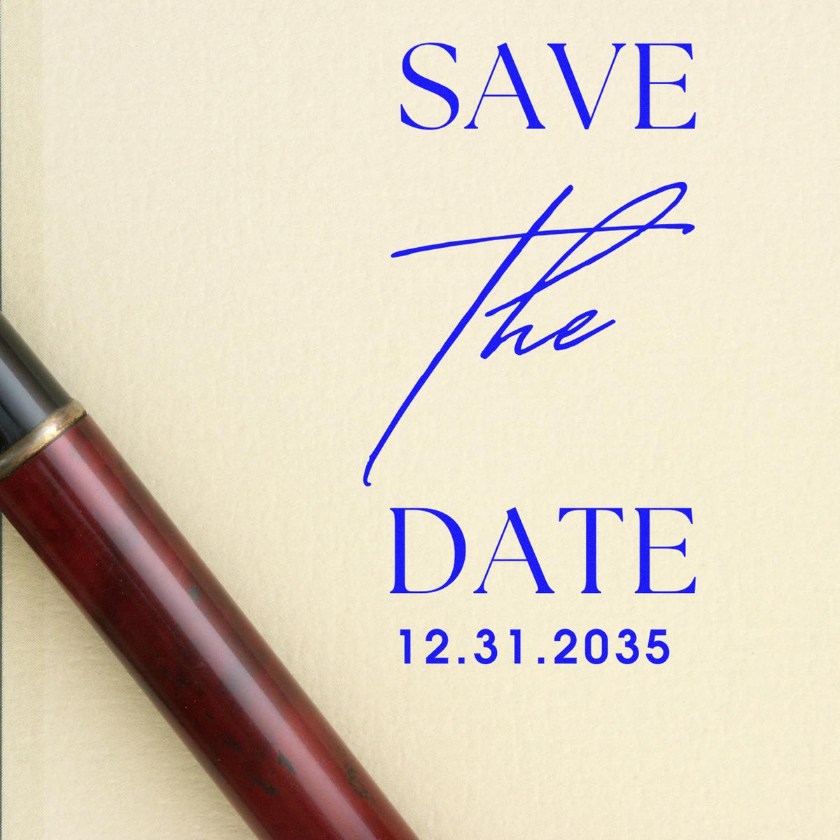 Beige save-the-date stamp and seal with blue text, signature, and burgundy handle, dated 12.31.2035