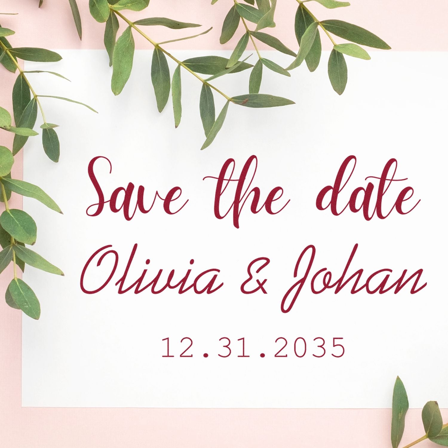 Burgundy custom save the date stamp and seal for Olivia & Johan, dated 12.31.2035, on white card with green olive leaves.