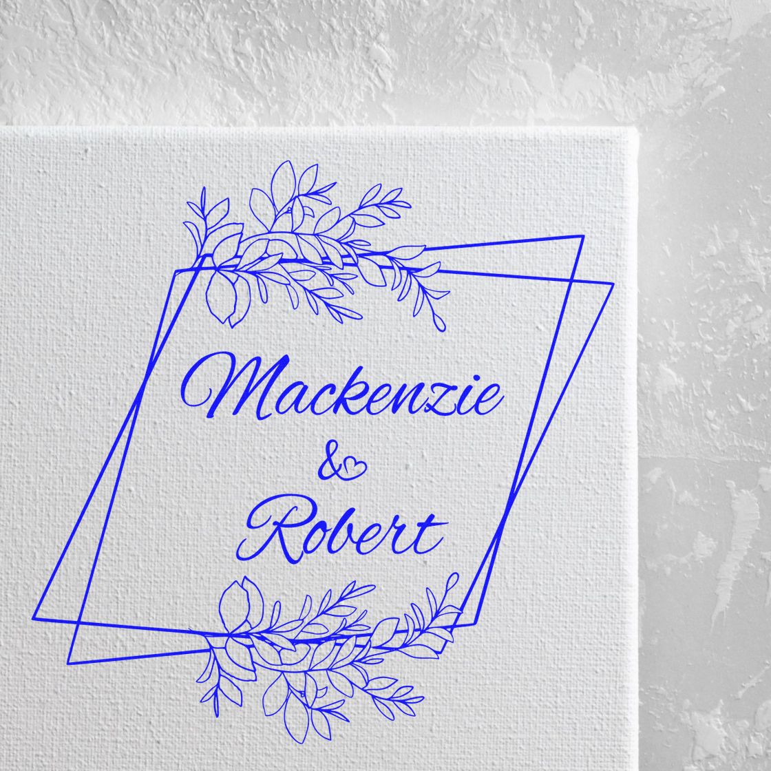 Blue floral wedding stamp and seal design with Mackenzie & Robert on white canvas.