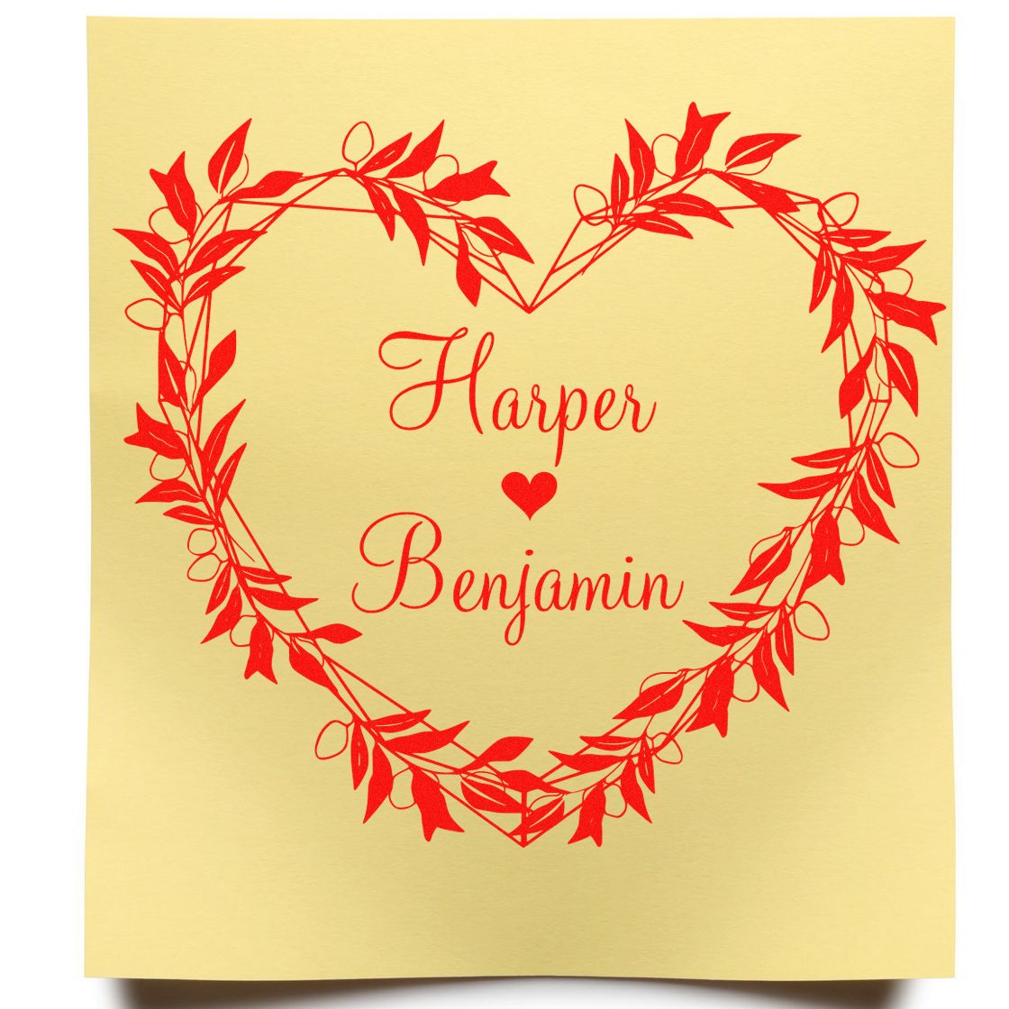 Gold wedding stamp seal with red leafy heart wreath, Harper and Benjamin names, and a small heart.