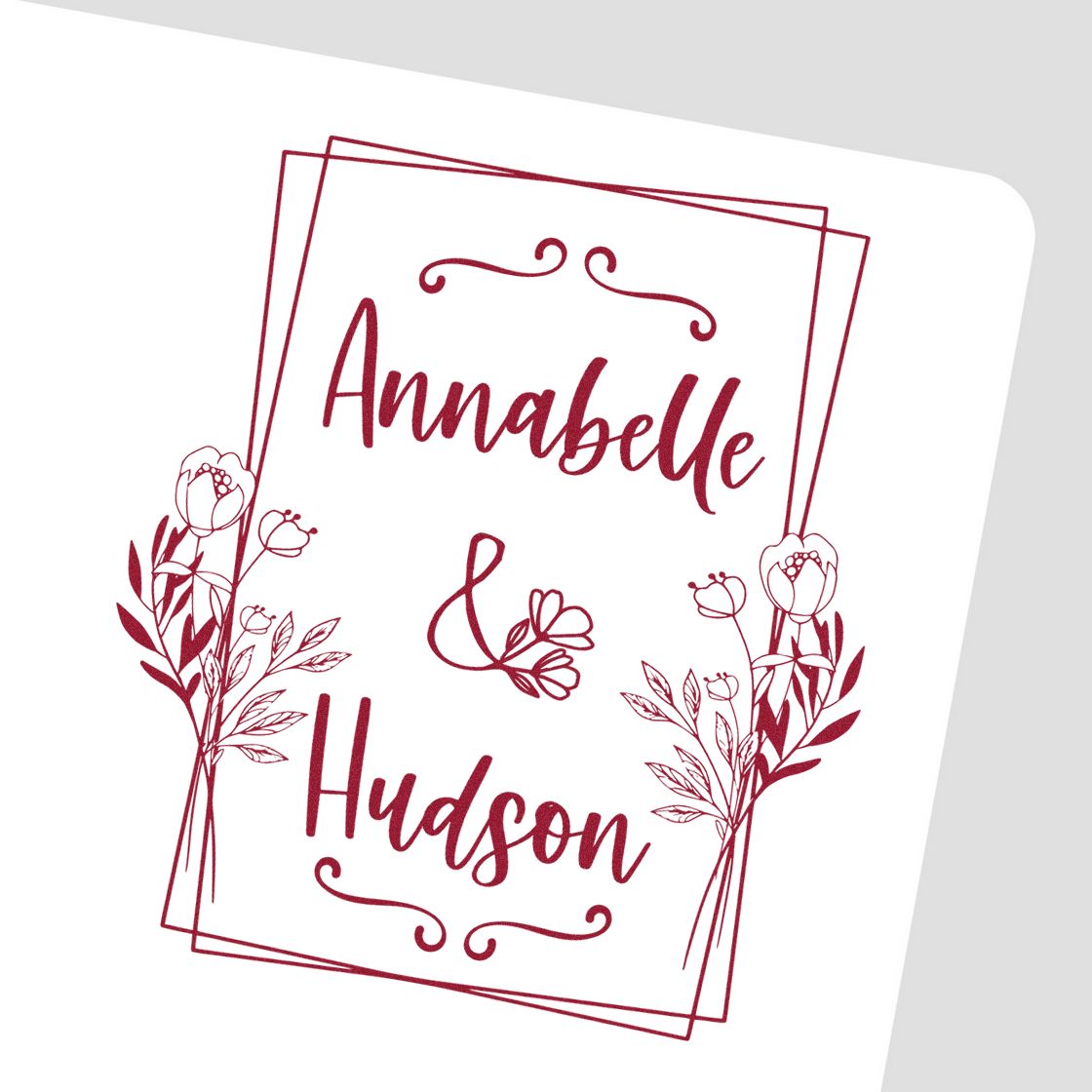 Burgundy personalized stamp and seal design with Annabelle & Hudson, floral line art, and ornate frame.