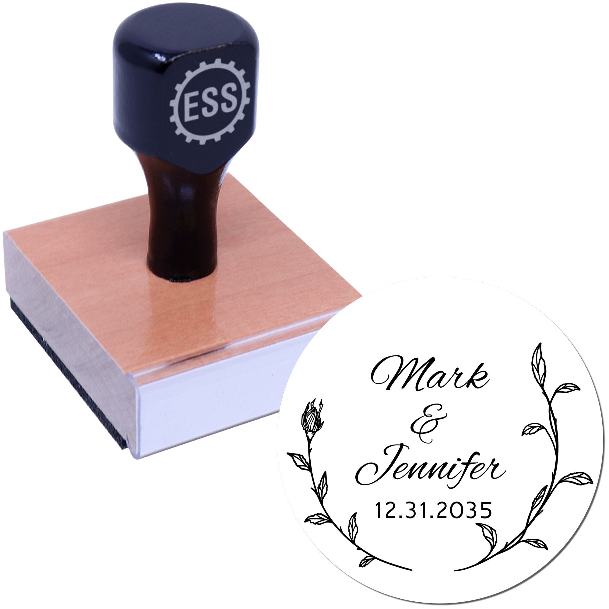 Dark navy custom stamp on wood block with circular white wedding seal, floral wreath, and Mark & Jennifer 12.31.2035.