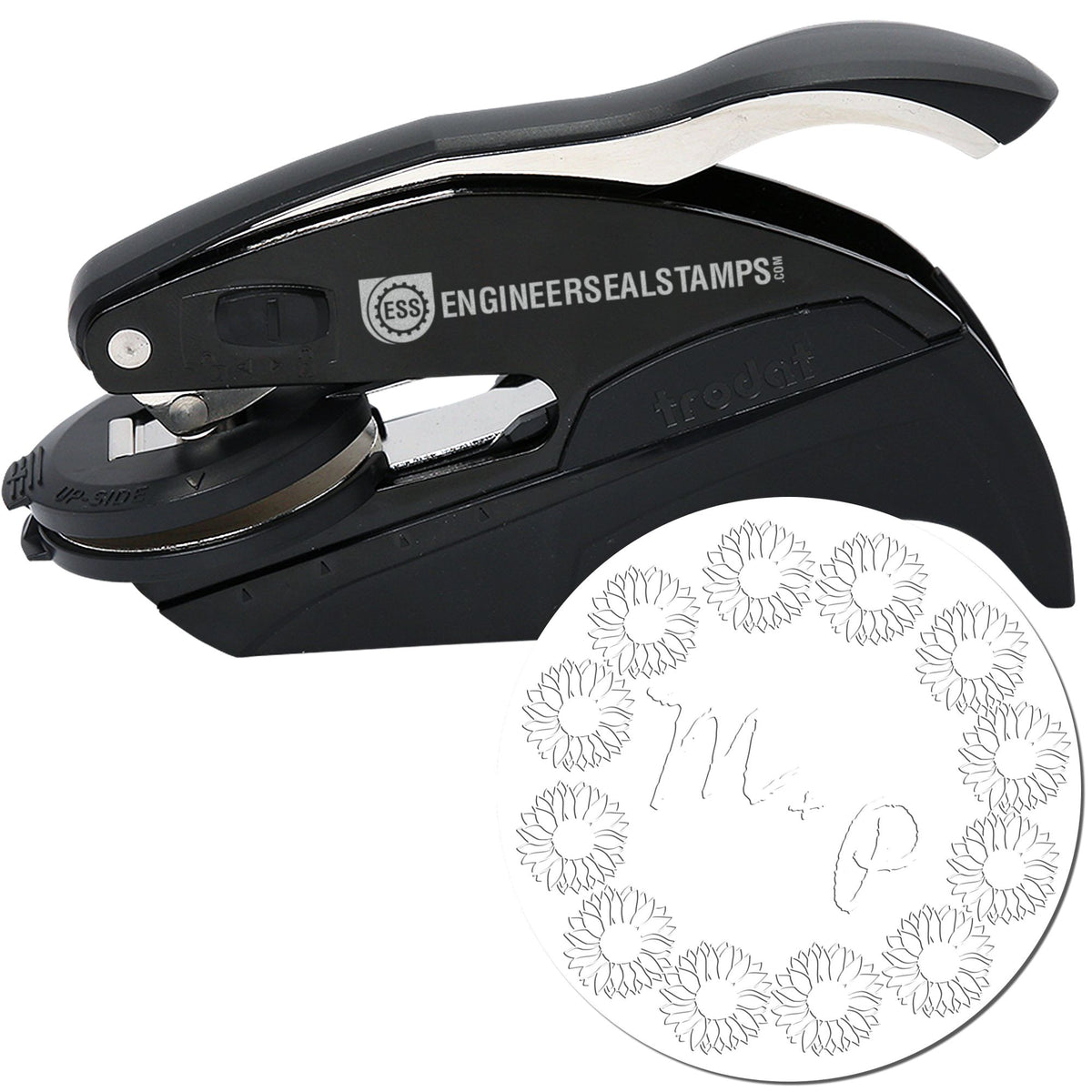 Black metal desk embosser stamp with silver handle and white circular engineer seal impression.