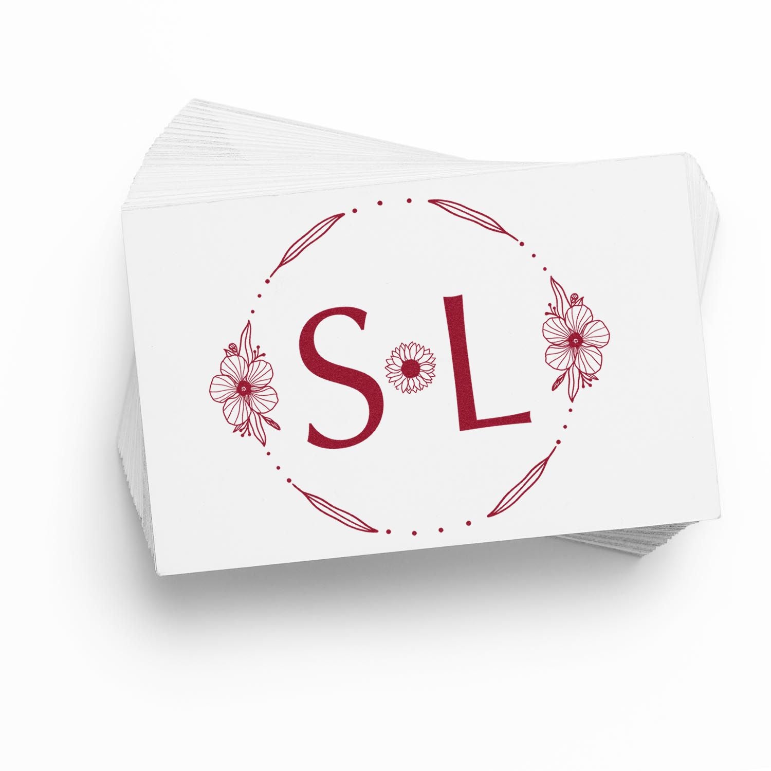Burgundy floral stamp seal with SL monogram on stacked white cards