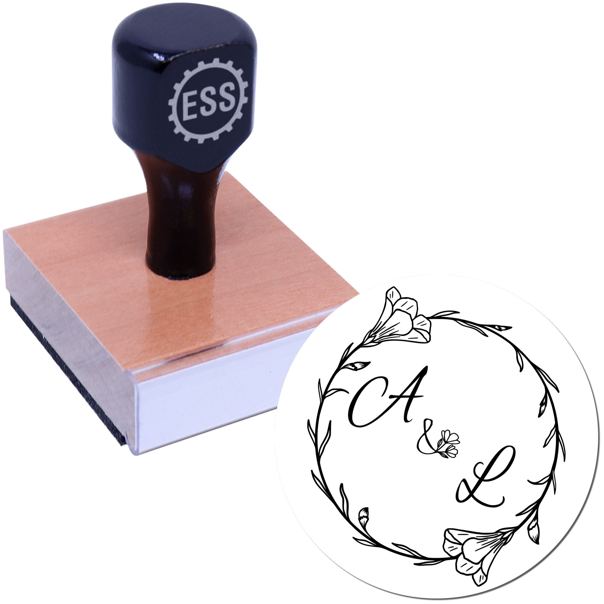 Navy-blue rubber stamp on wooden base with ESS logo and circular floral seal featuring initials C A & L.