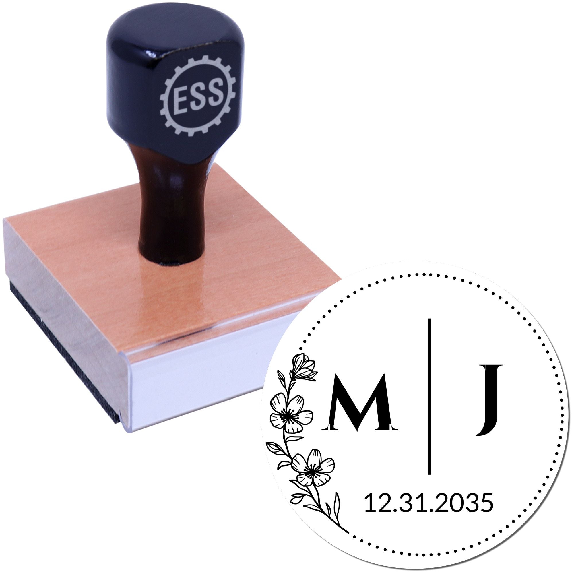 Black rubber stamp on wooden block with custom floral seal, initials M and J, and date 12.31.2035
