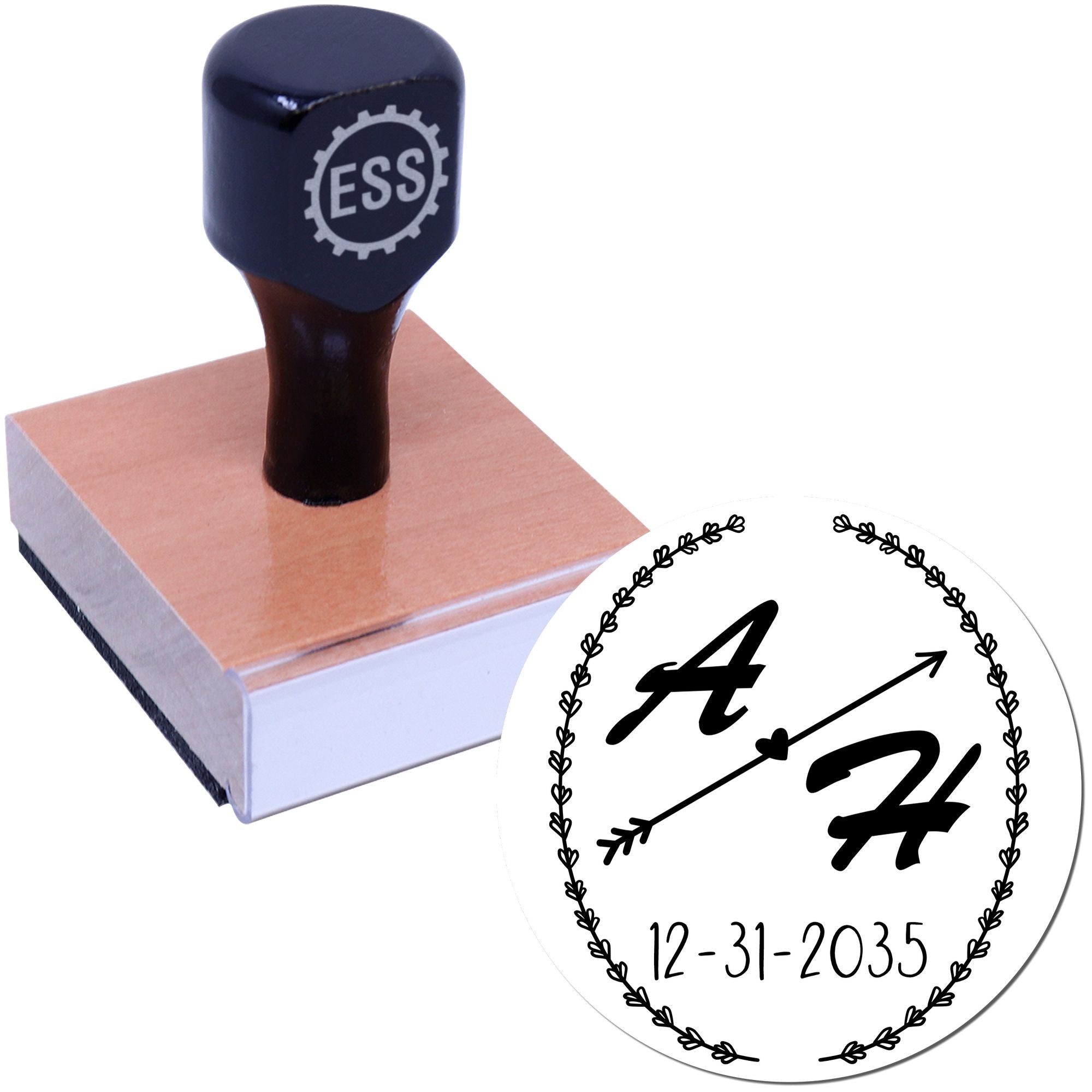 Black ESS rubber stamp on a wooden base with a circular wreath seal design, arrow graphic, and 12-31-2035 date.