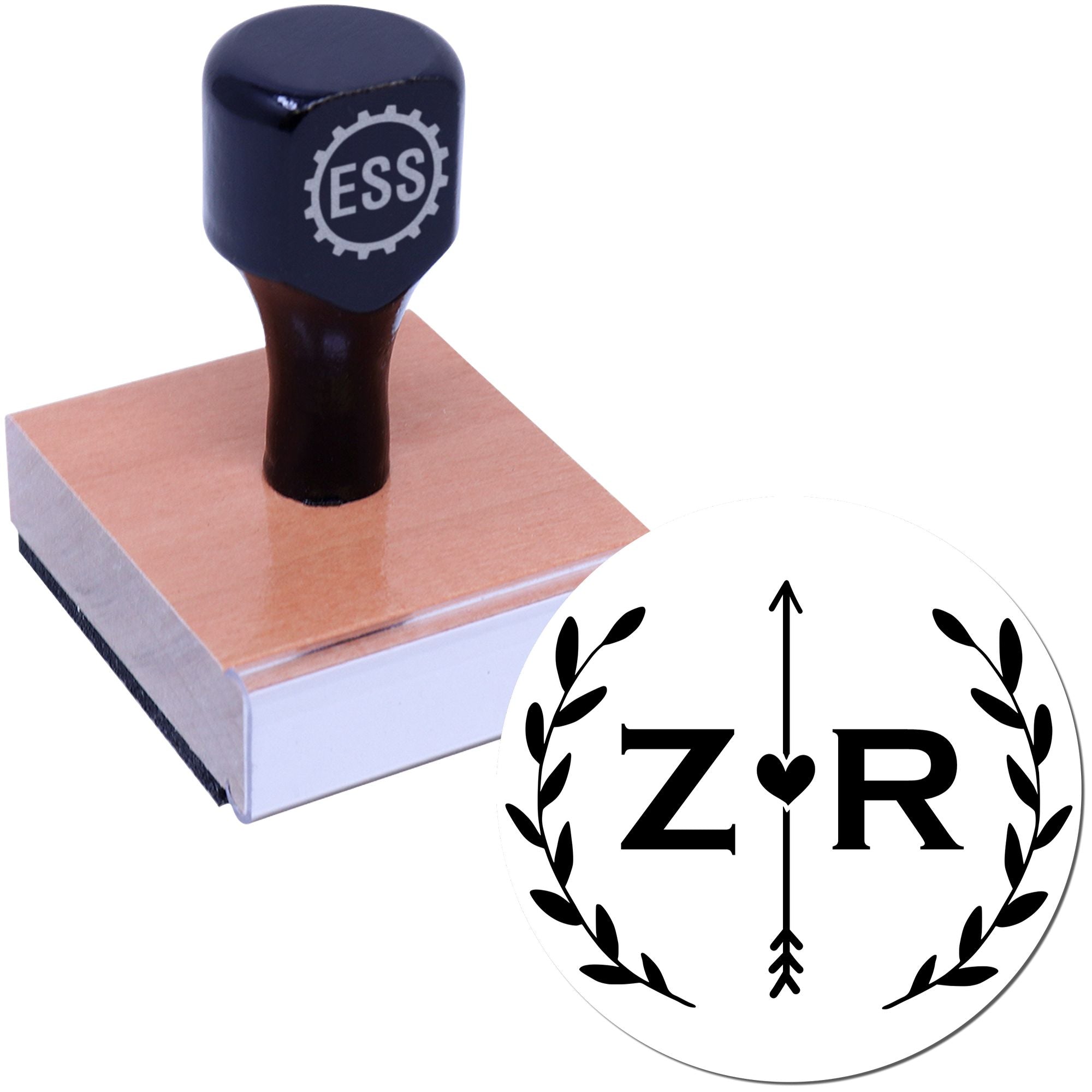 Dark navy rubber stamp on a wooden block with ESS logo, beside a round black-and-white ZR seal with laurel branches.