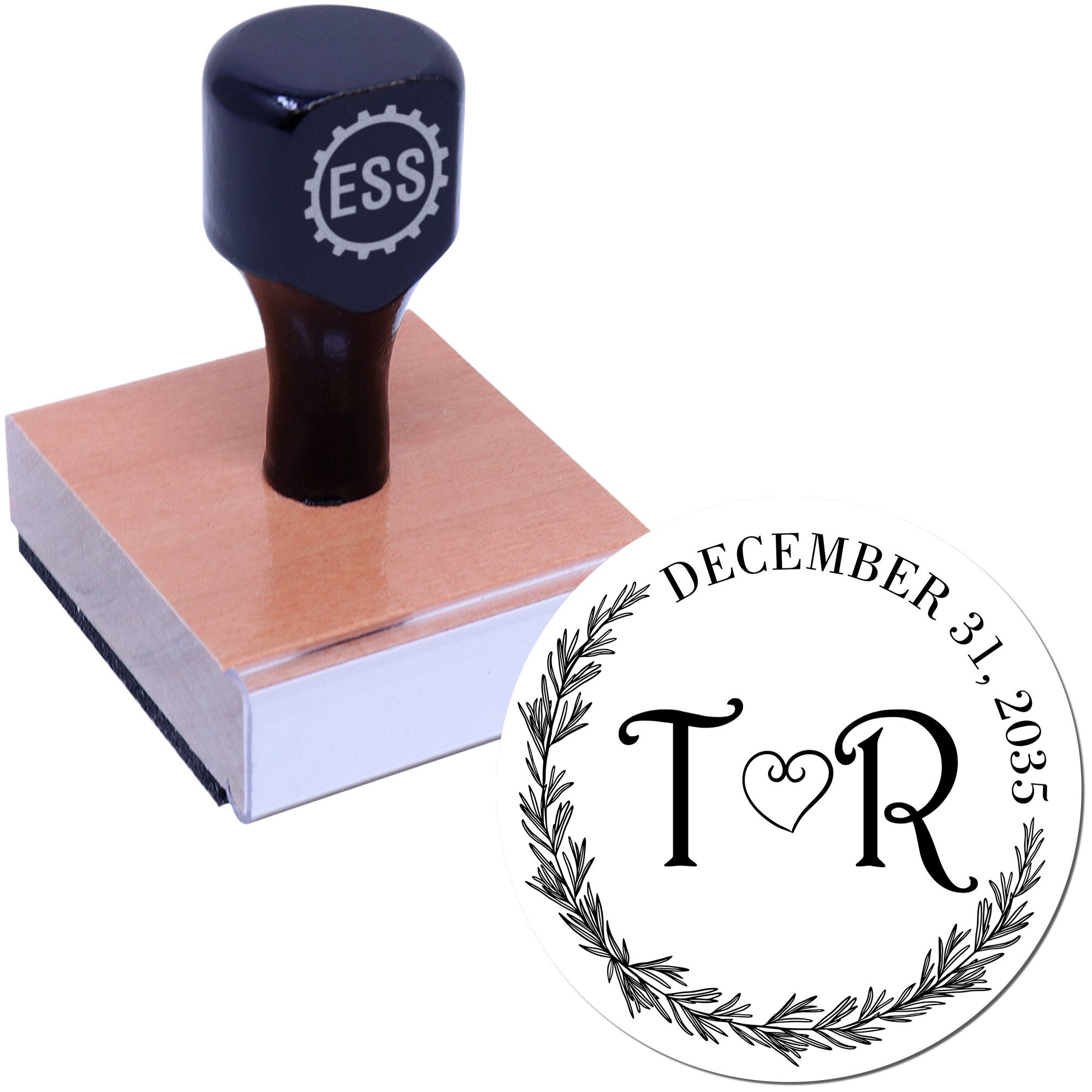 Black ESS rubber stamp on wooden base beside round white seal with TR monogram, laurel wreath, and December 31, 2035.