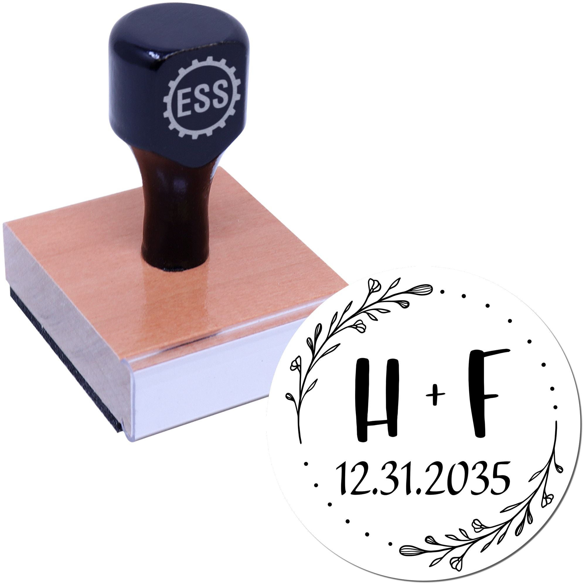 Custom rubber stamp with ESS handle and round white seal design, black H+F initials, floral wreath, and date 12.31.2035.