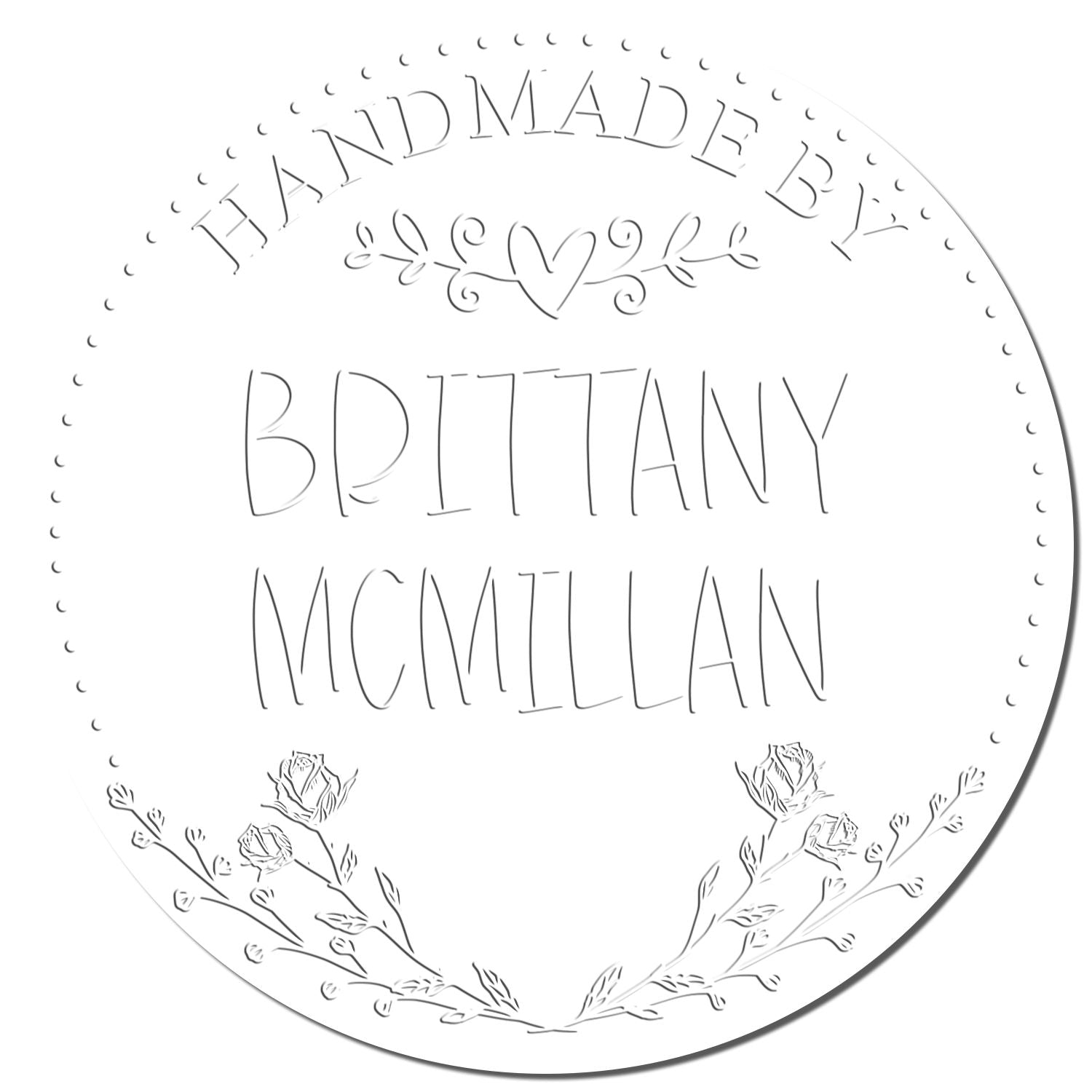 White circular handmade stamp seal with black text, dotted border, and floral accents for Britany McMillan.
