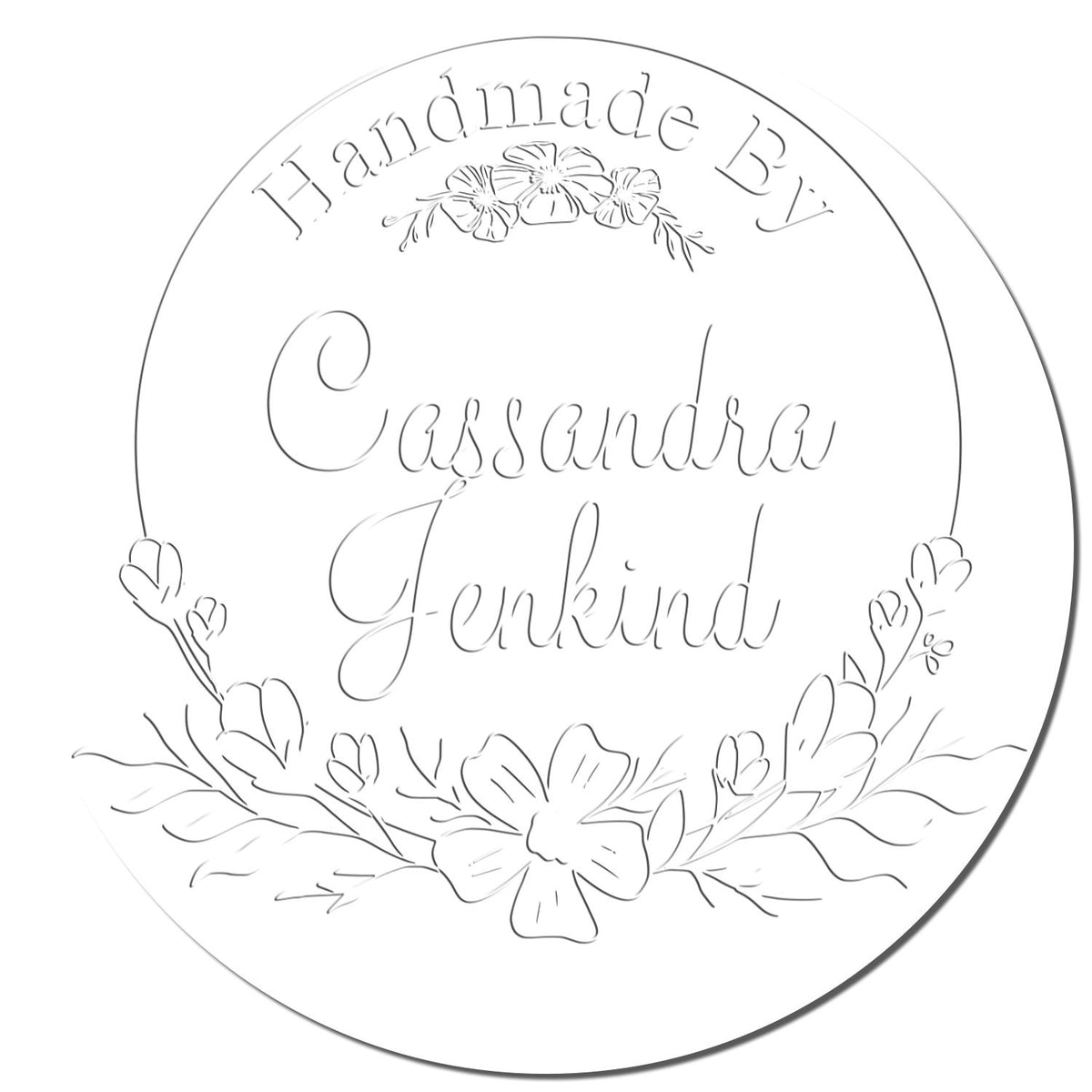 Close-up of a handmade Shiny thank you stamp with a soft floral artisan seal embossing, showcasing detailed design and personalized imprint.