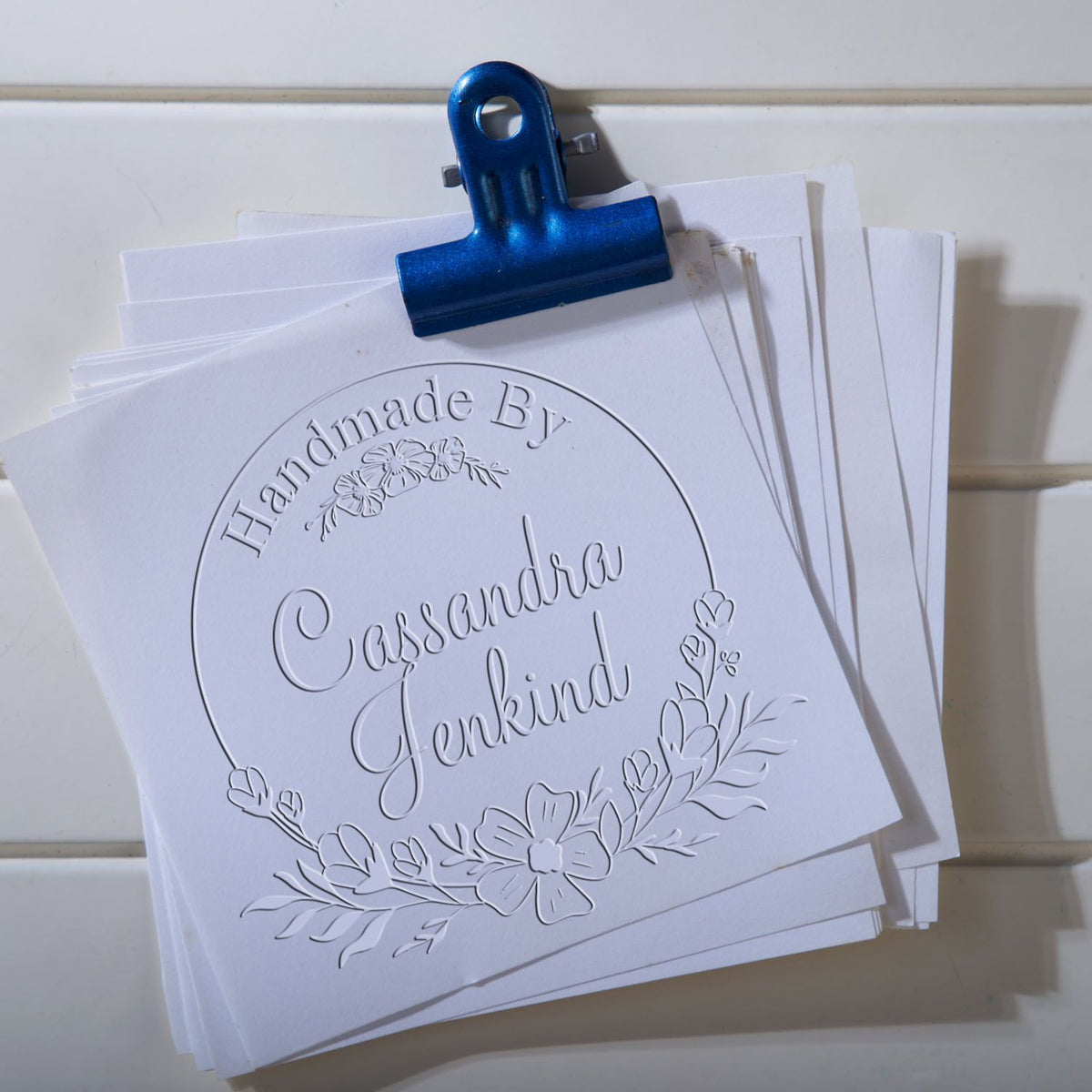 Shiny soft floral artisan thank you stamp embossing seal in use, showcasing its personalized handmade design and floral details.