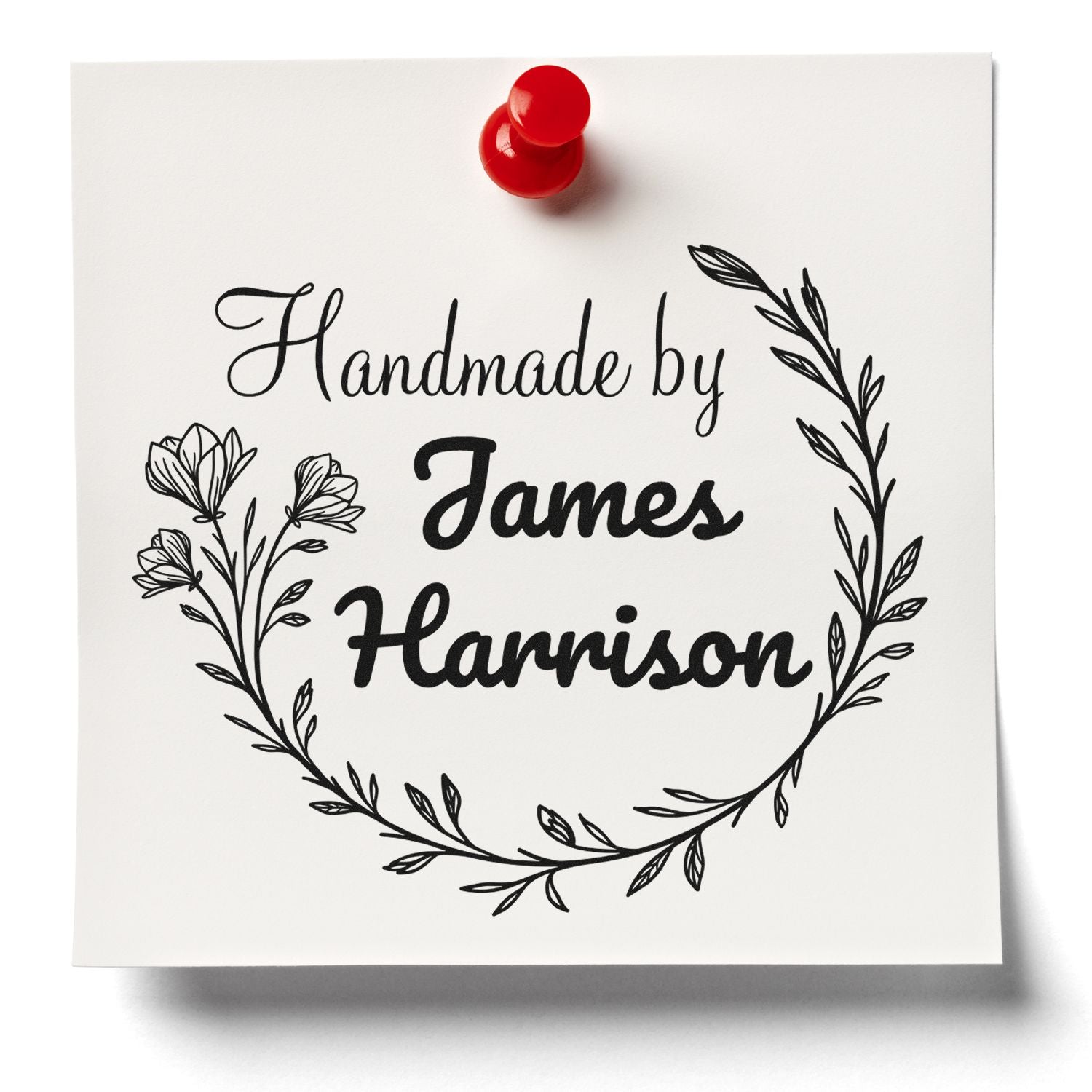 Custom handmade by James Harrison stamp with black floral wreath design and red wax seal on white card.