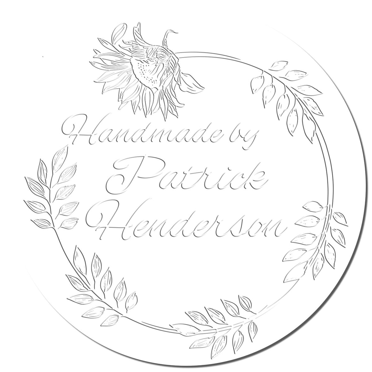 Circular white handmade stamp seal with floral wreath and script text Handmade by Patrick Henderson